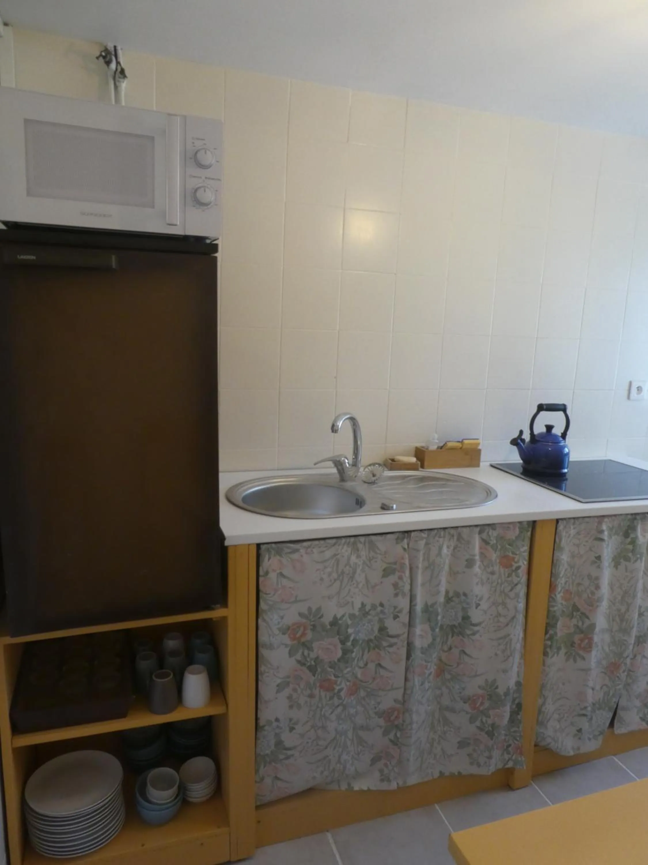 Kitchen or kitchenette in Les chambres du Ladoux