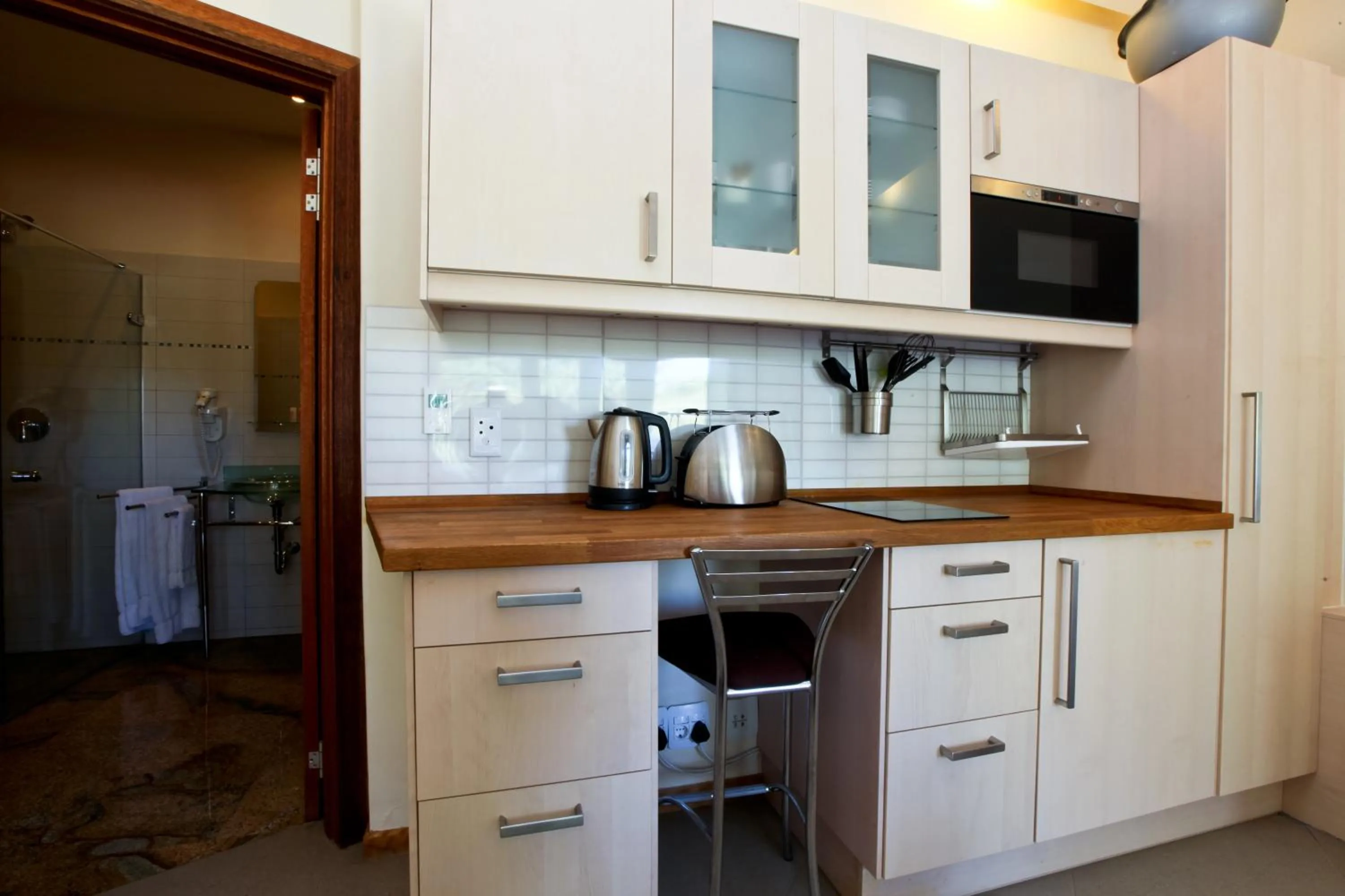 Kitchen or kitchenette in Roof of Africa Hotel