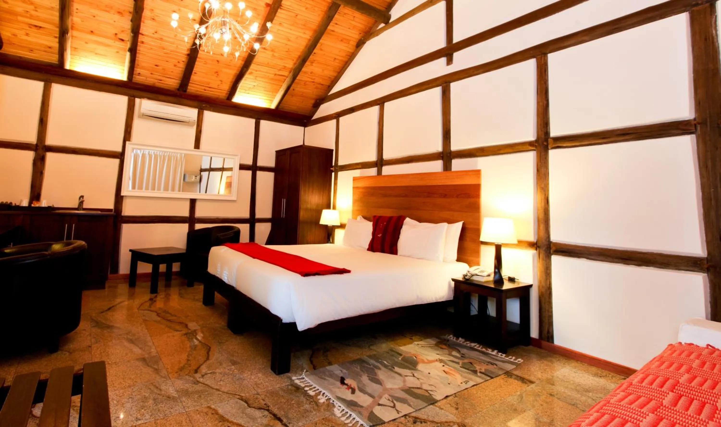 Photo of the whole room, Bed in Roof of Africa Hotel