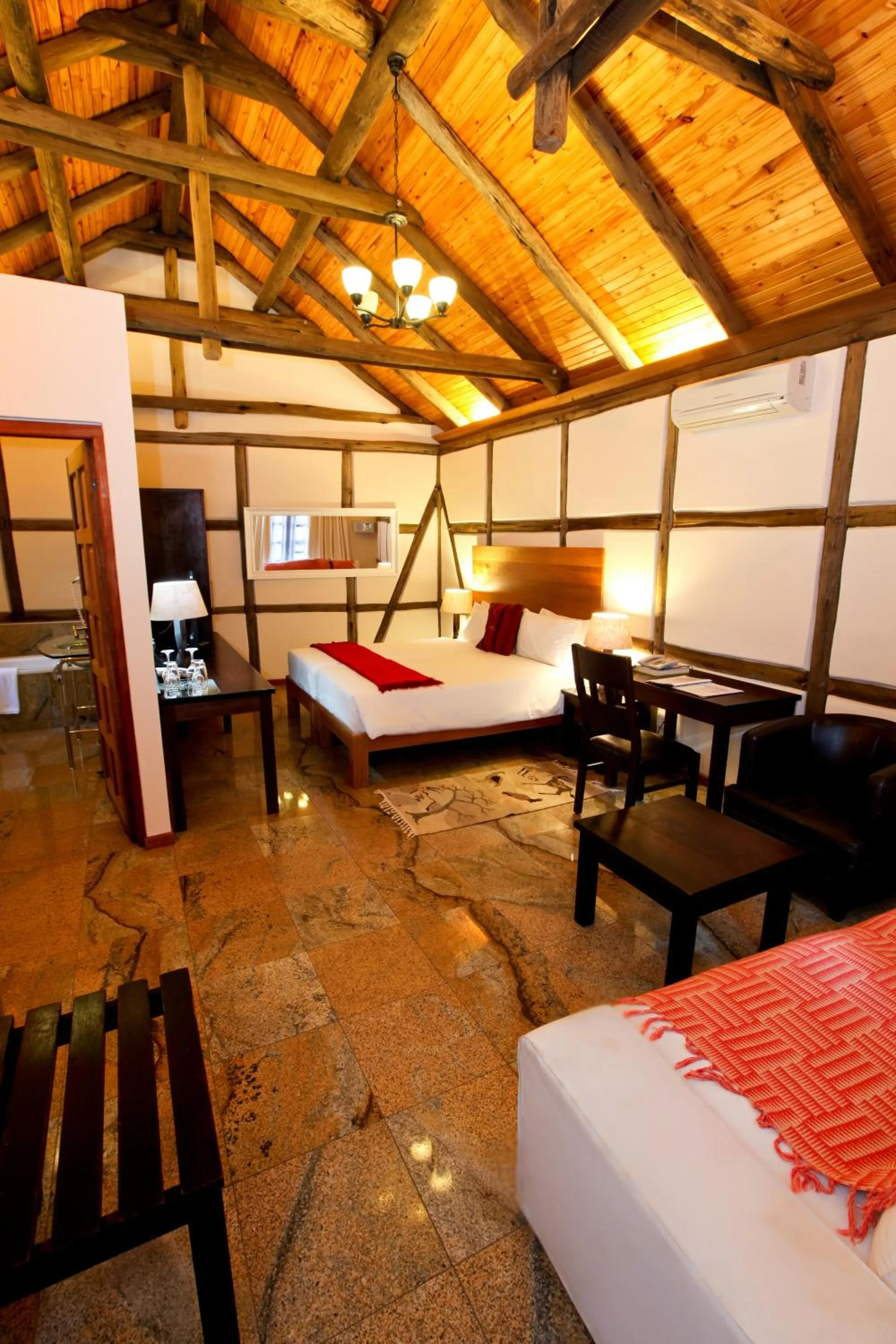 Photo of the whole room, Bed in Roof of Africa Hotel