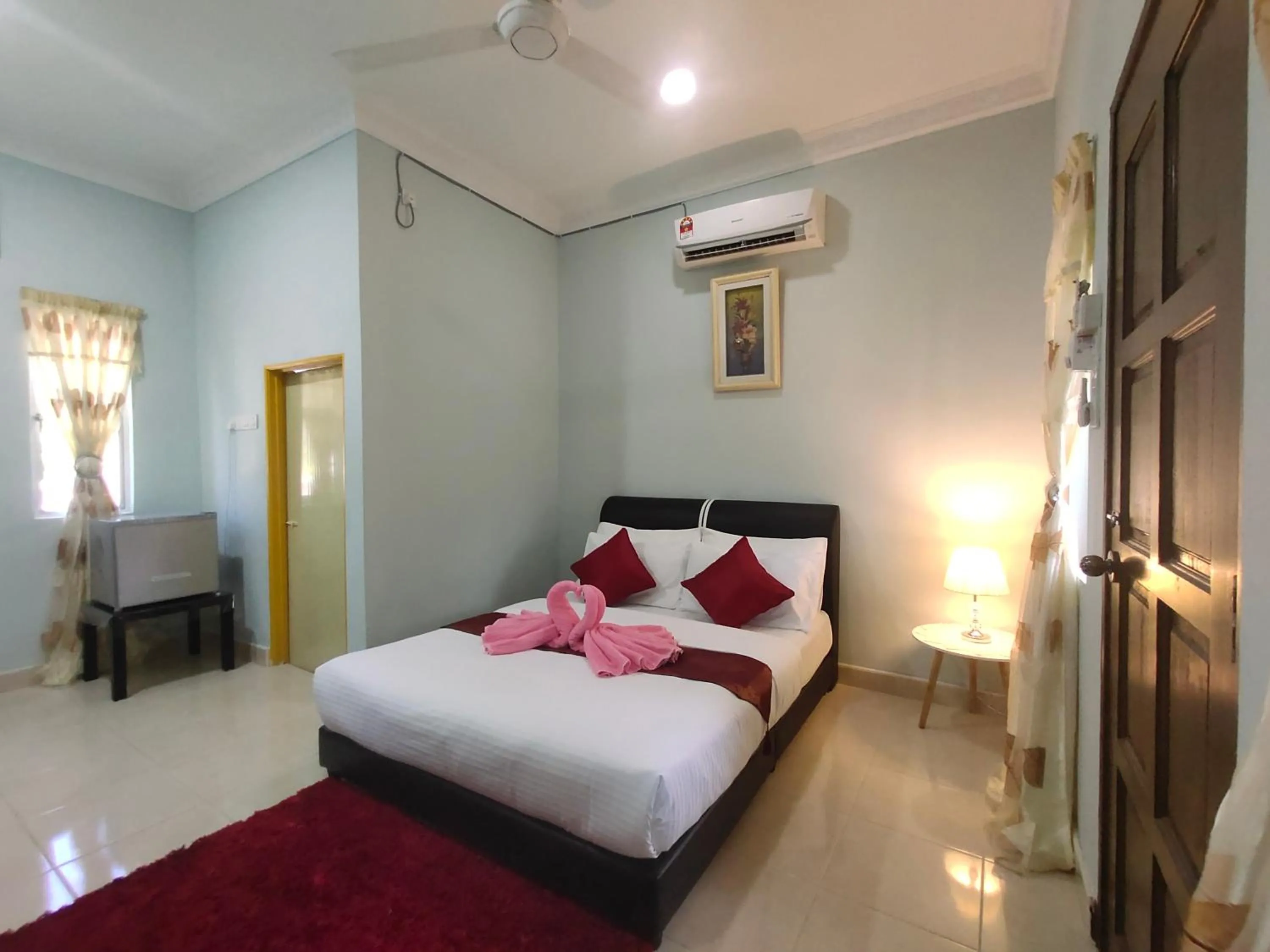 Bed in Ku's Roomstay