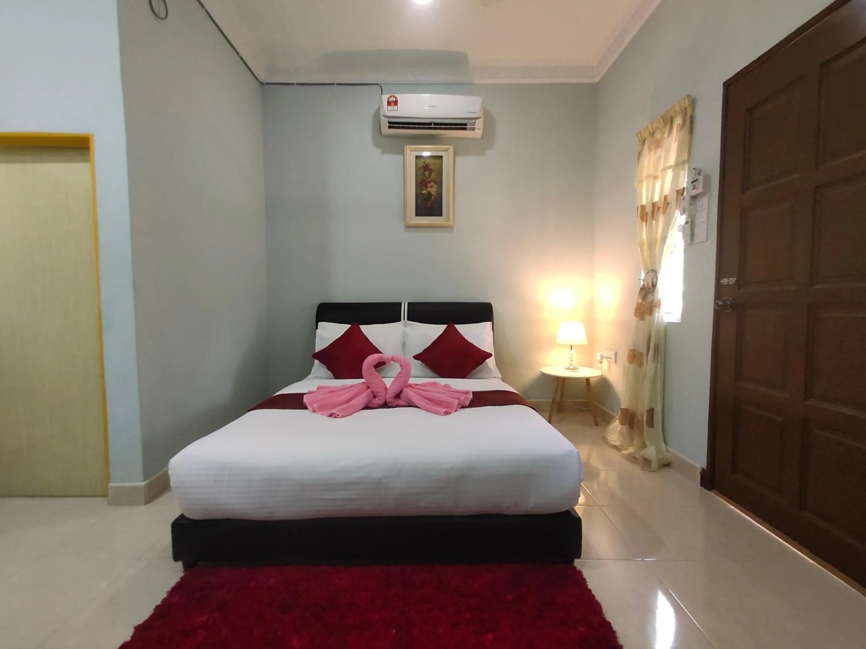 Bed in Ku's Roomstay