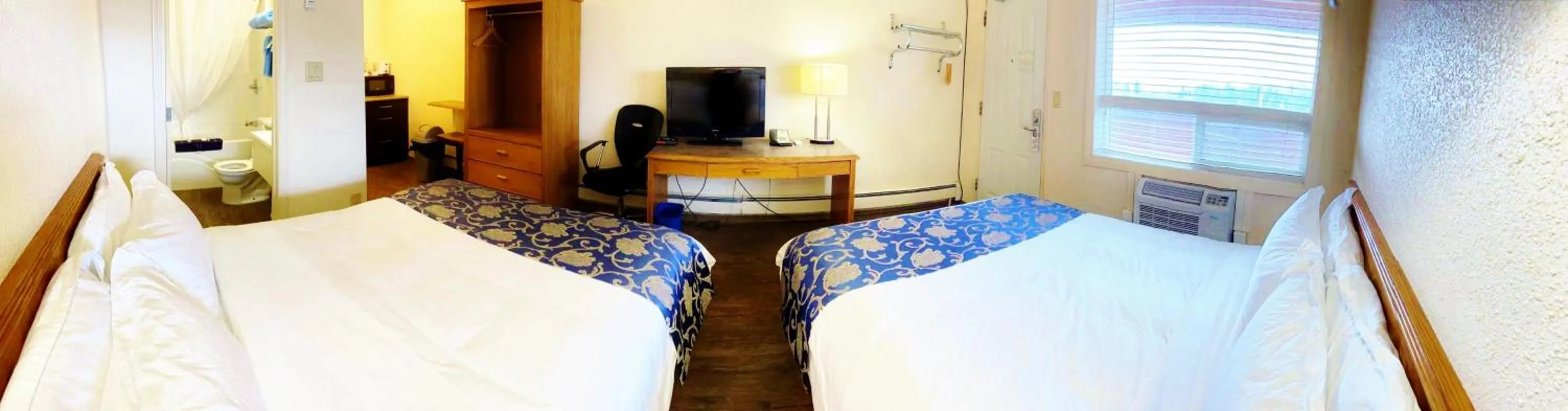 Bed in Grande Mountain Lodge