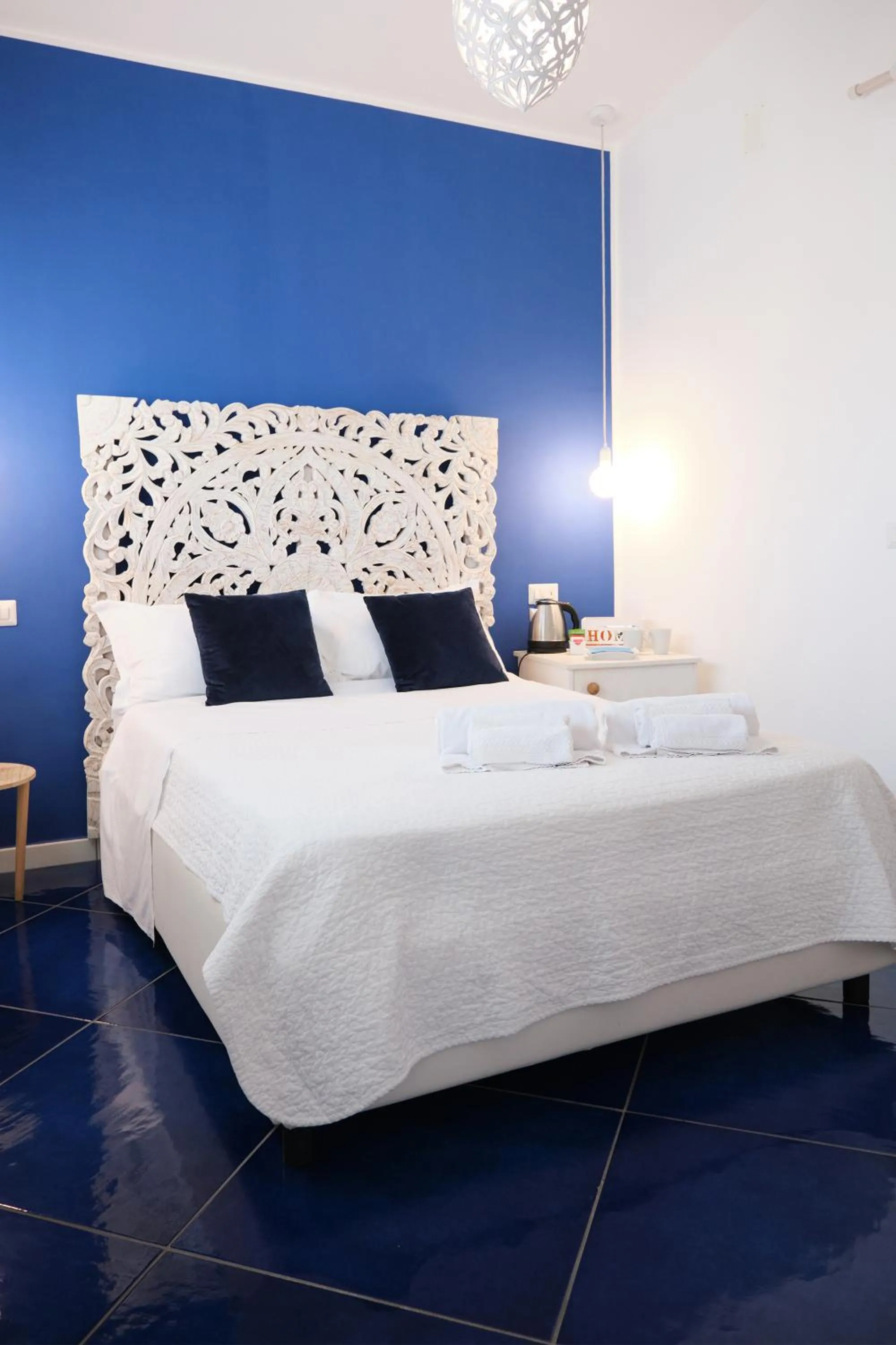 Bed in Pharus Miseni Suites and rooms