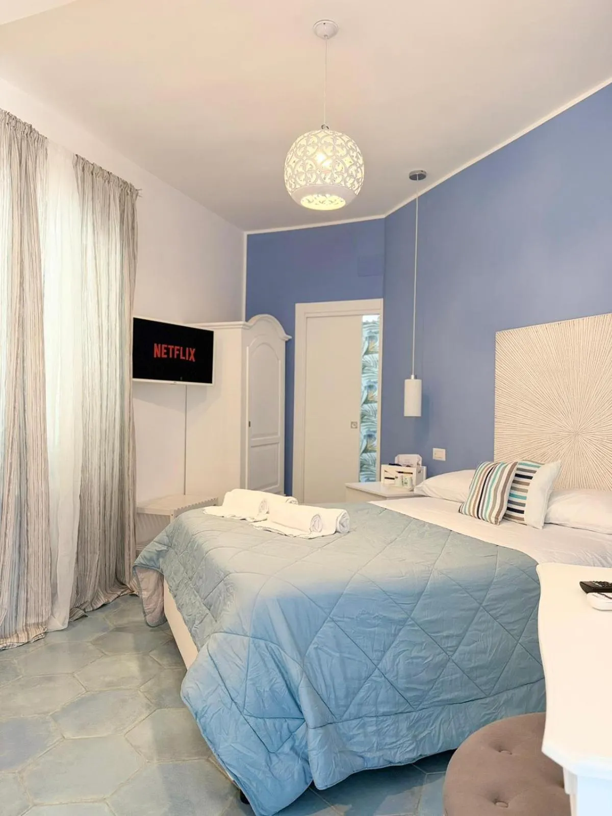 Bed in Pharus Miseni Suites and rooms