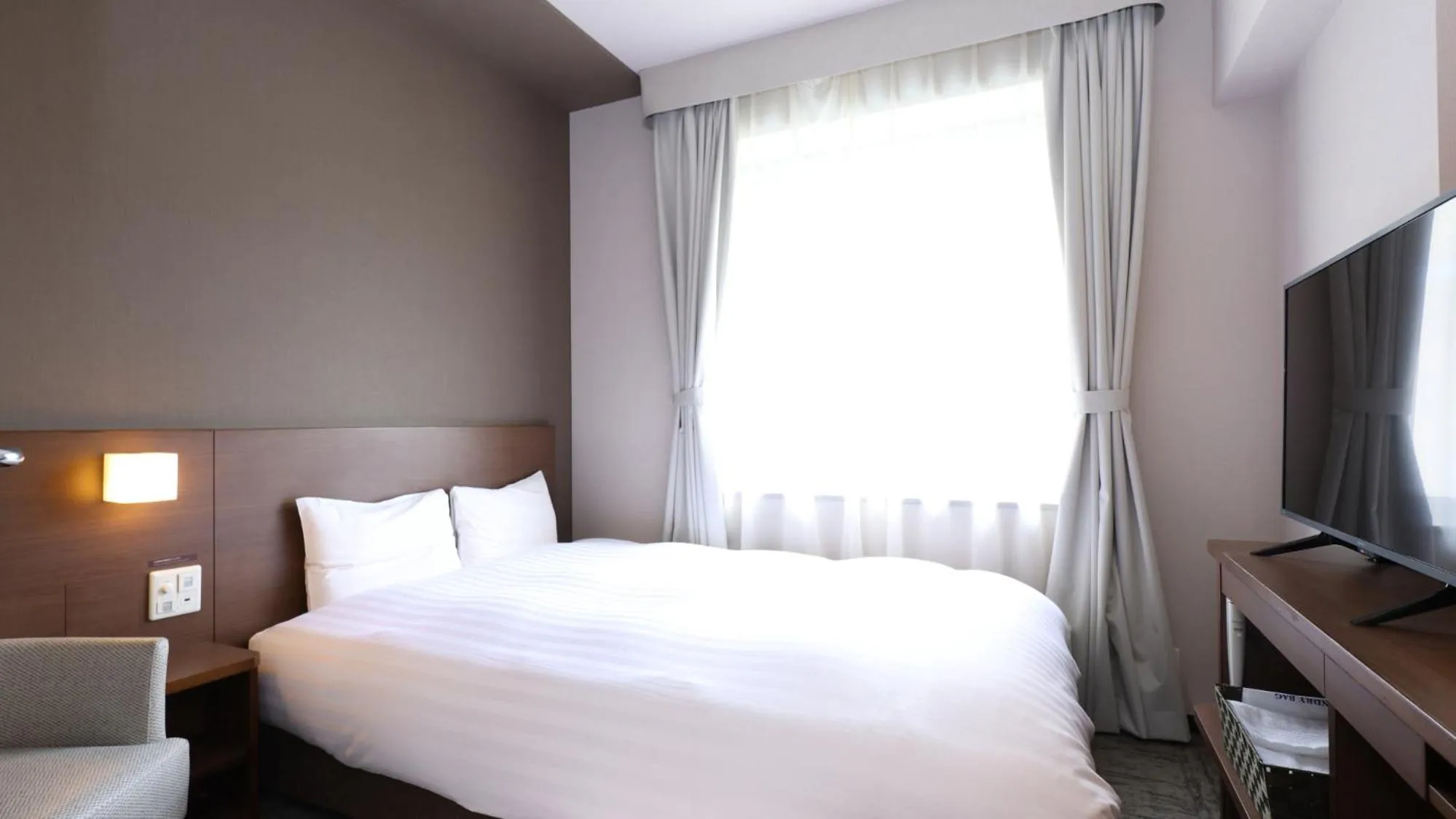 Bedroom, Bed in Dormy Inn Premium Shibuya-jingumae