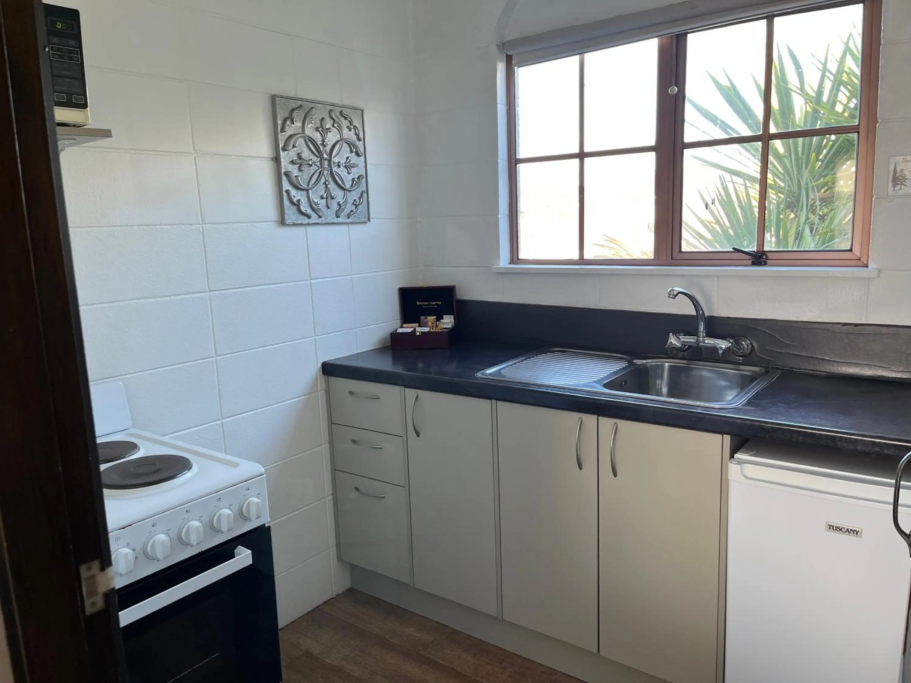 Kitchen or kitchenette in Rotorua Motel