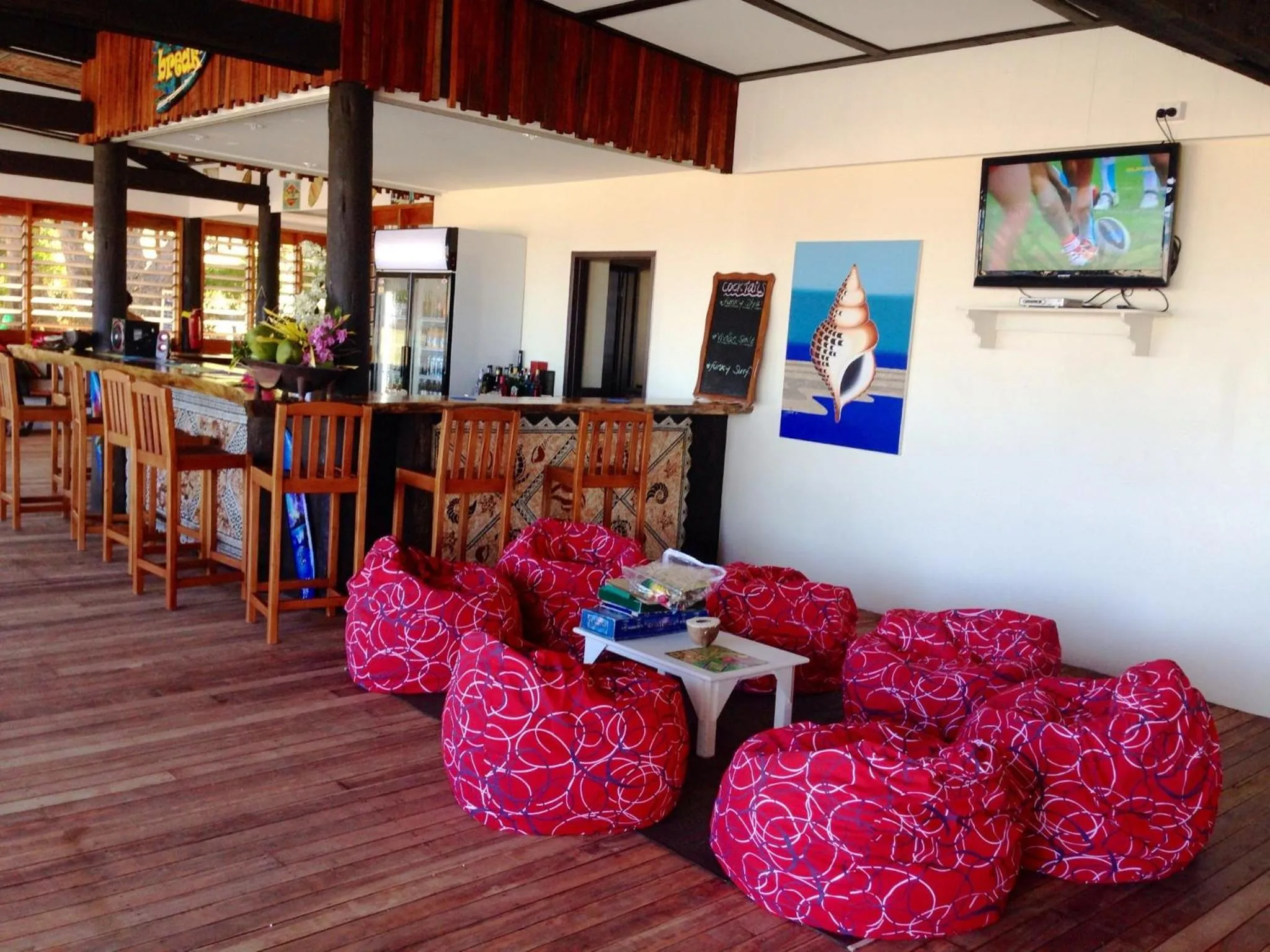 Communal lounge/ TV room in Funky Fish Beach & Surf Resort
