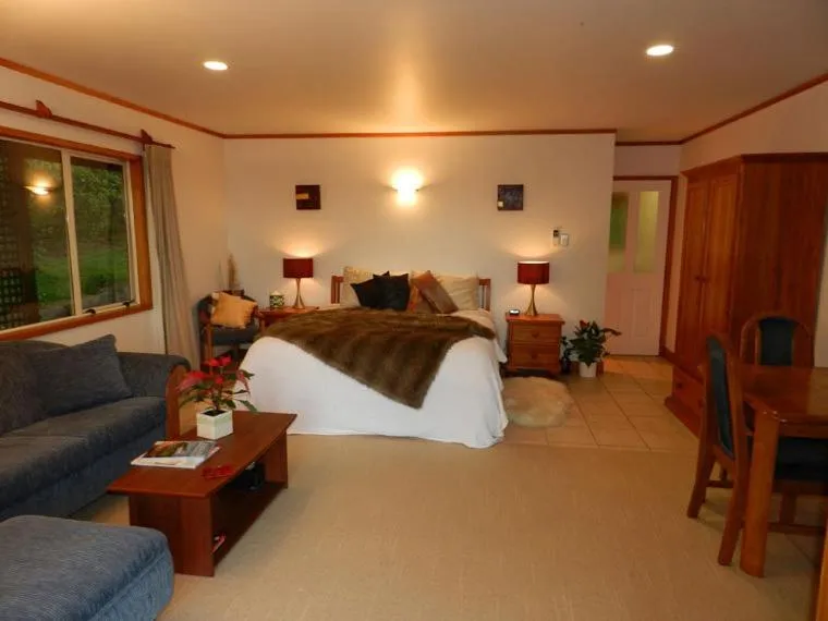 Bed in Puketotara Lodge