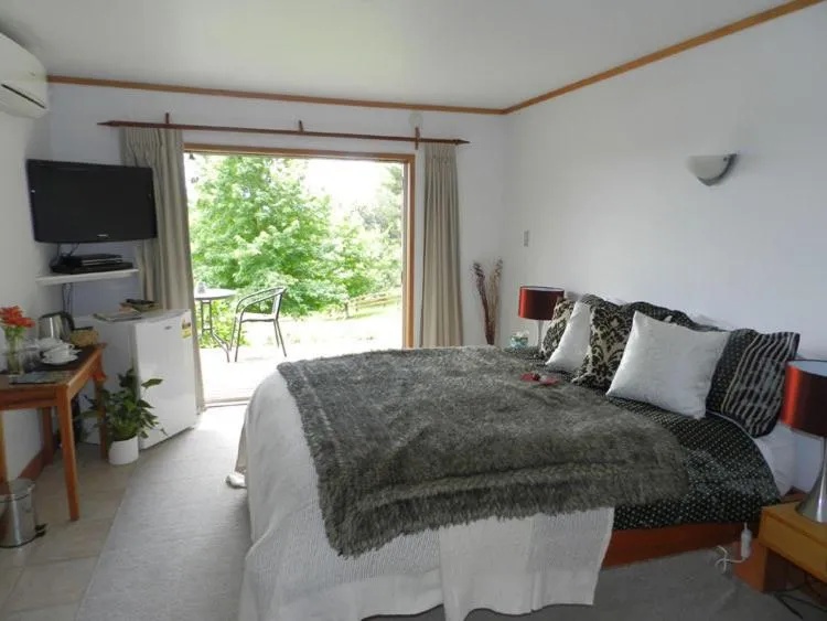 Bedroom, Bed in Puketotara Lodge