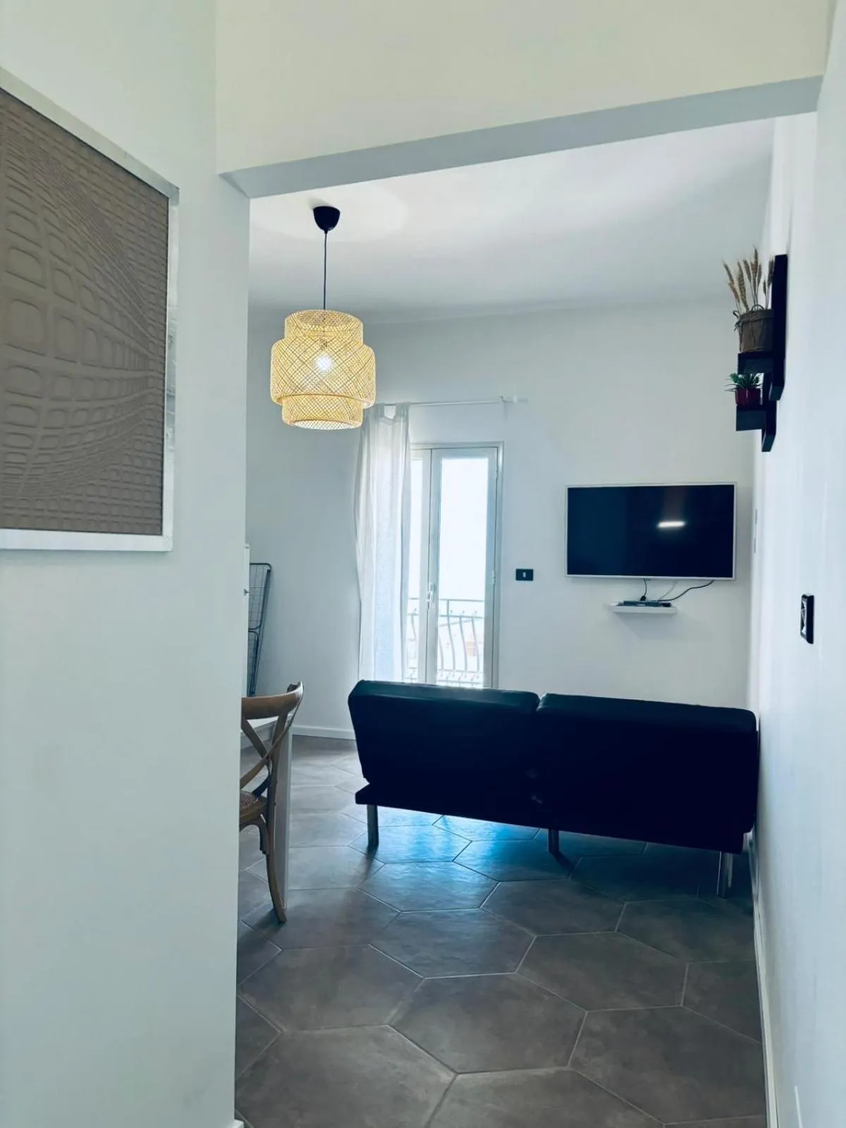 Communal lounge/ TV room in Manca Residence