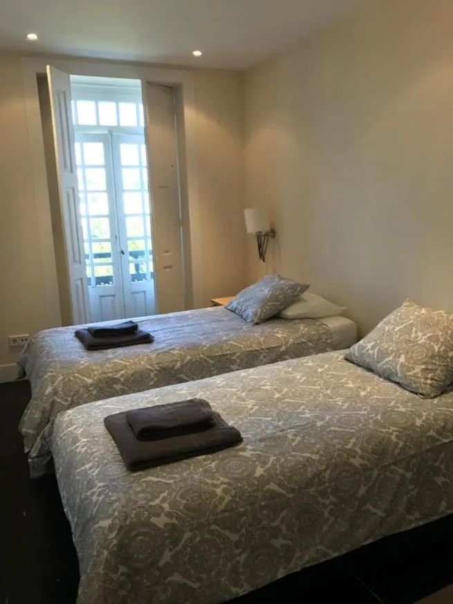 Bedroom, Bed in Camelia Rooms