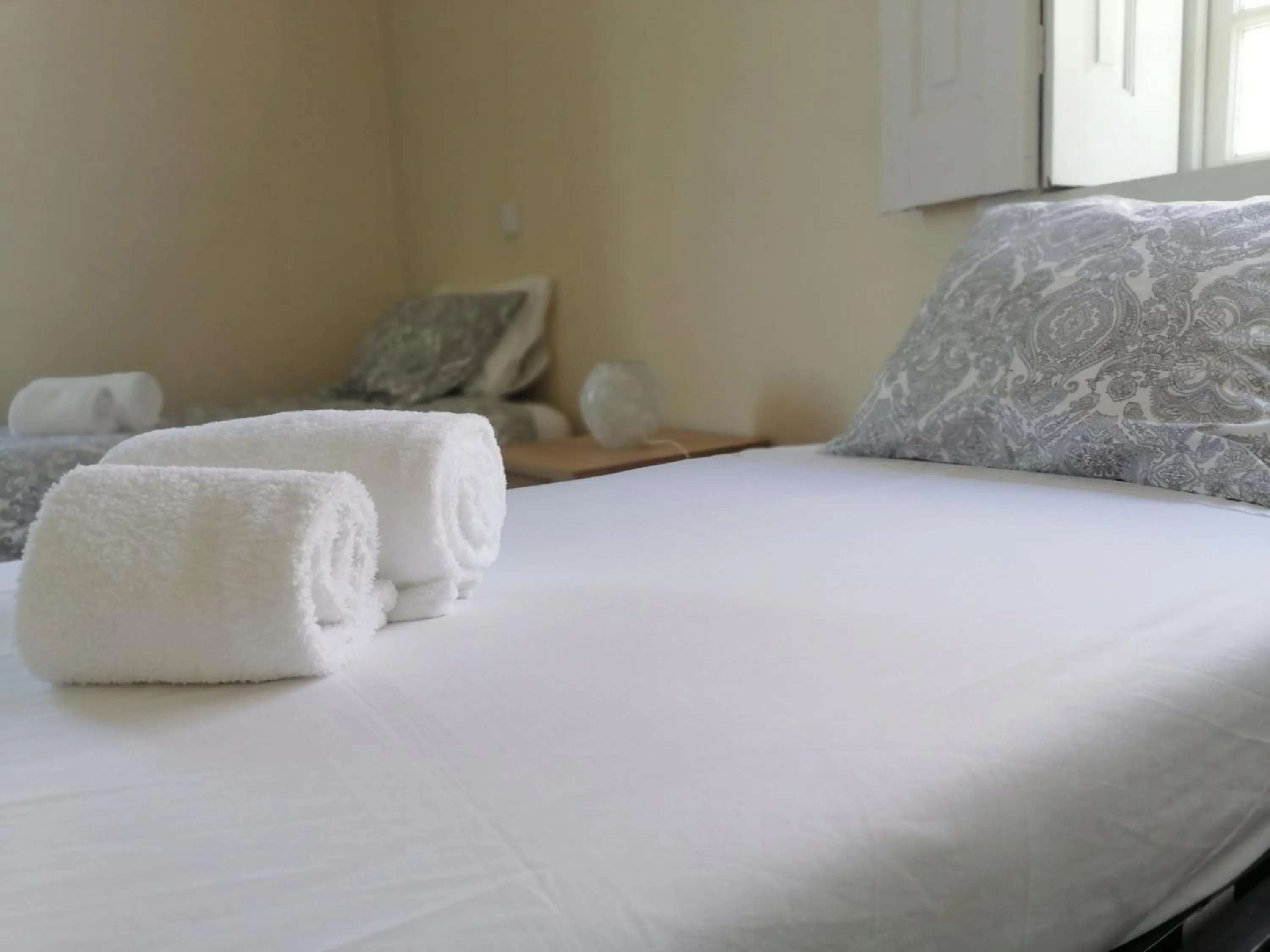 Bedroom, Bed in Camelia Rooms