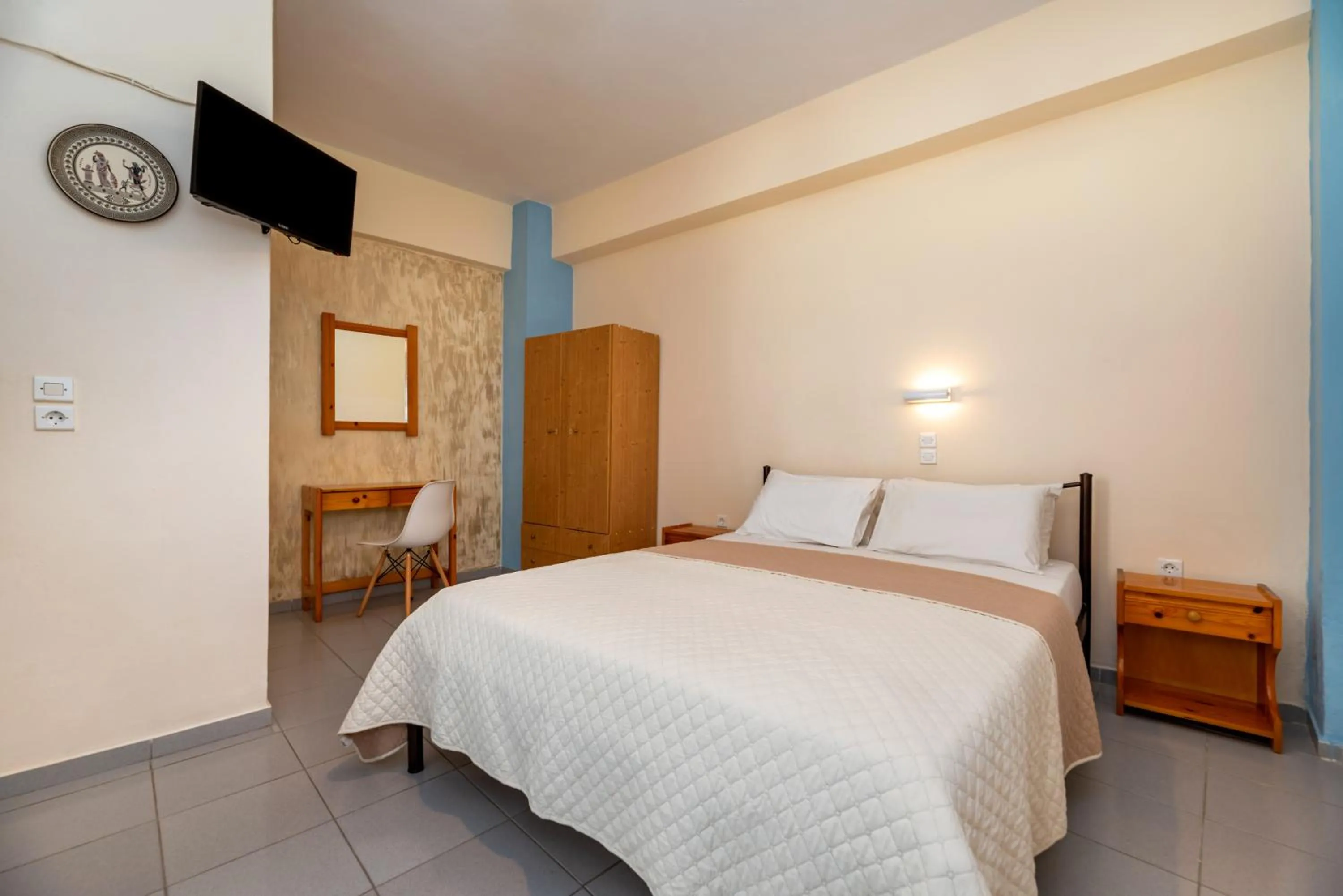 Bed in Onar Rooms & Studios