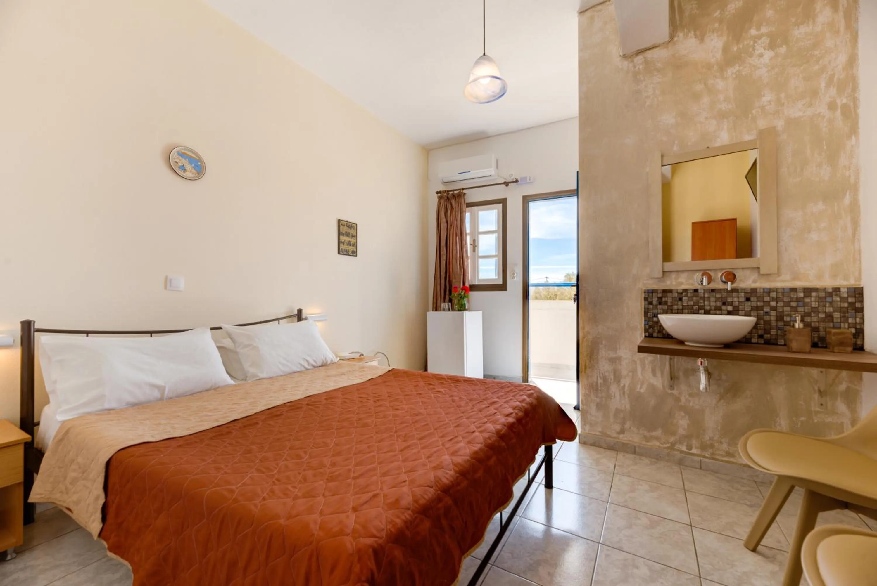 Bed in Onar Rooms & Studios