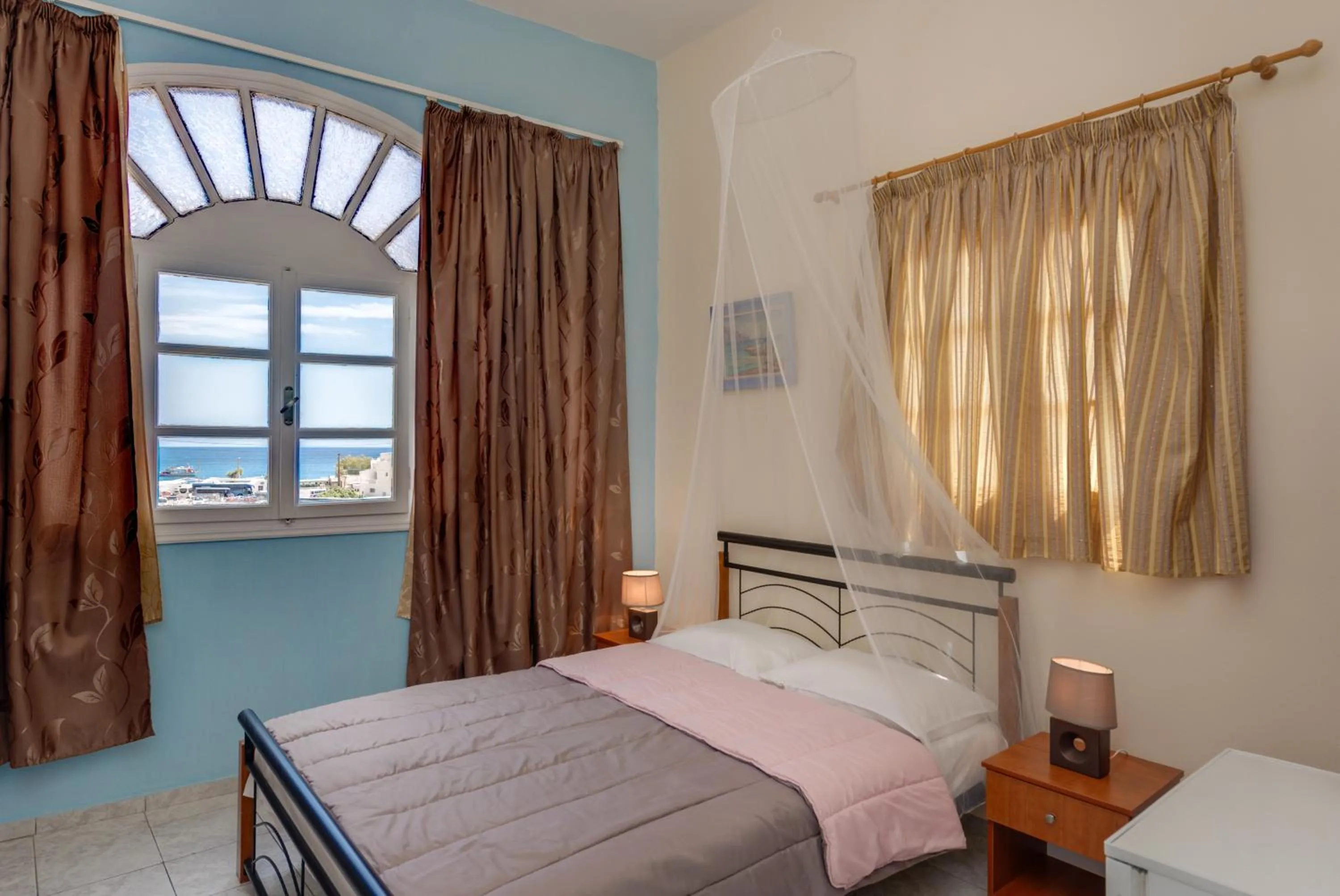 Bed in Onar Rooms & Studios