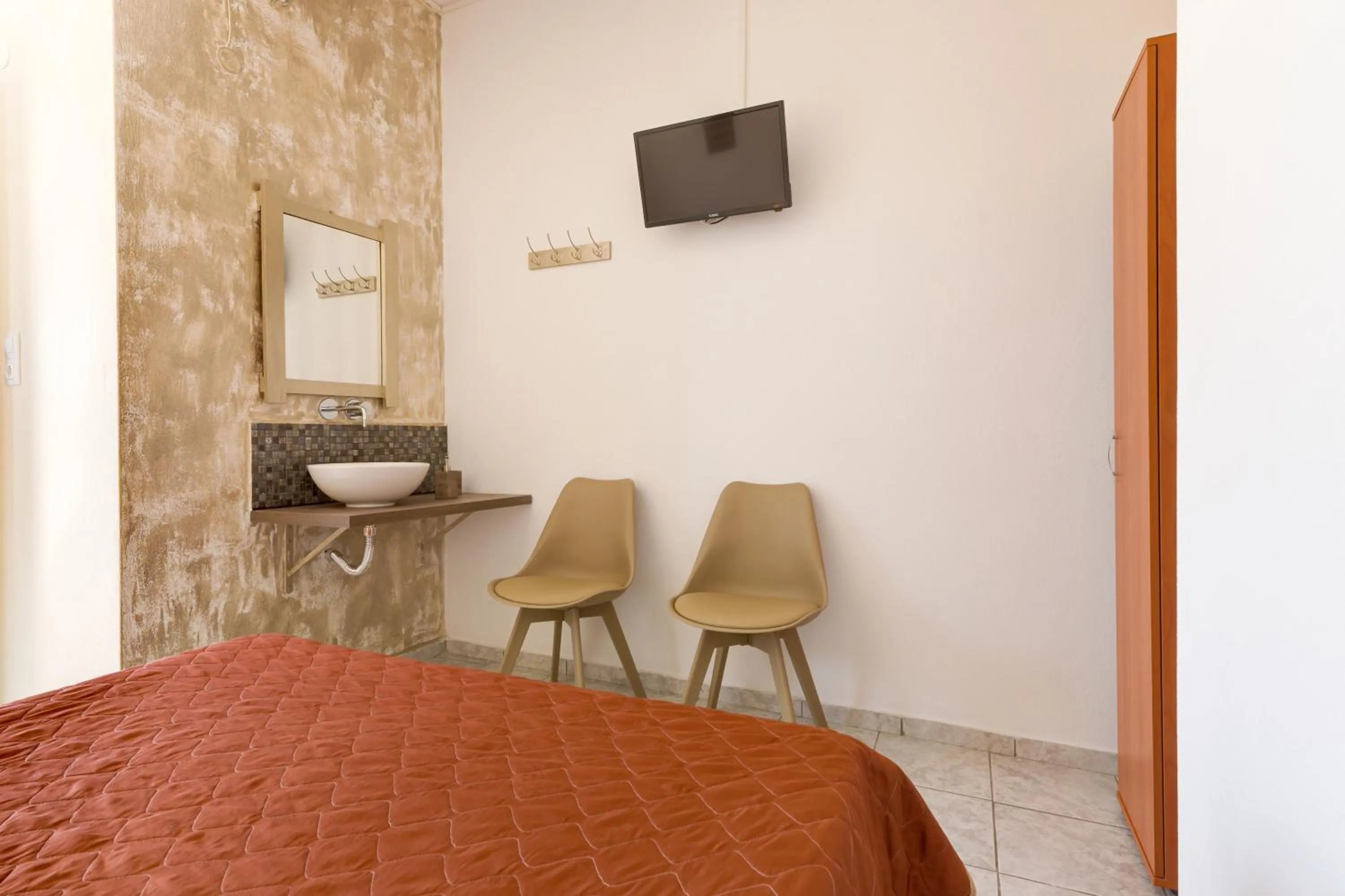 Bed in Onar Rooms & Studios