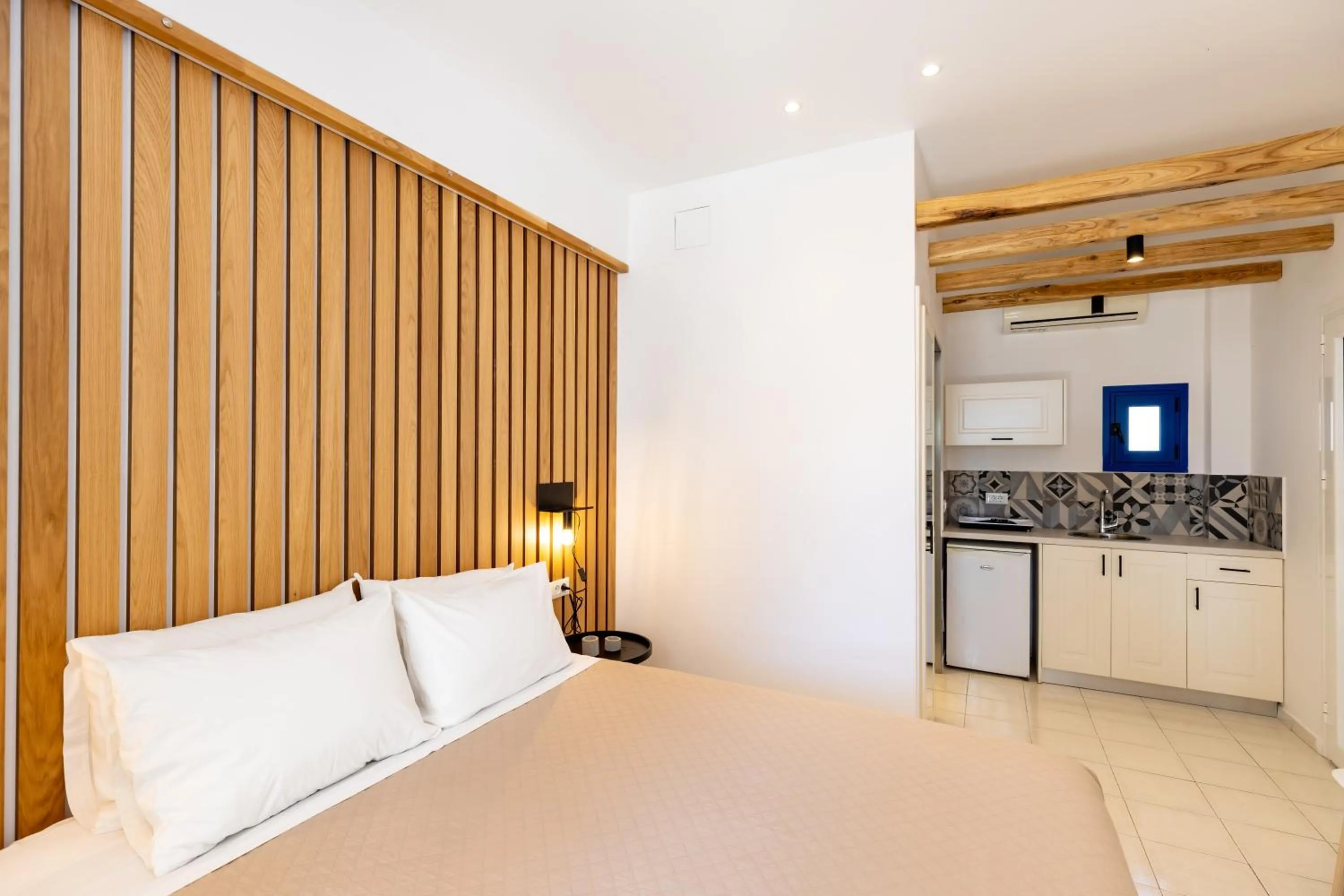 Bedroom, Bed in Louis Studios Santorini