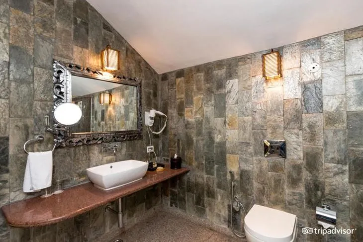 Shower in The Tree House Resort, A Club Mahindra Associate