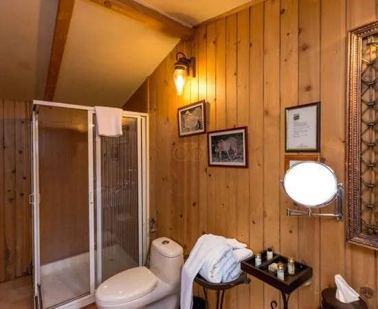 Shower in The Tree House Resort, A Club Mahindra Associate