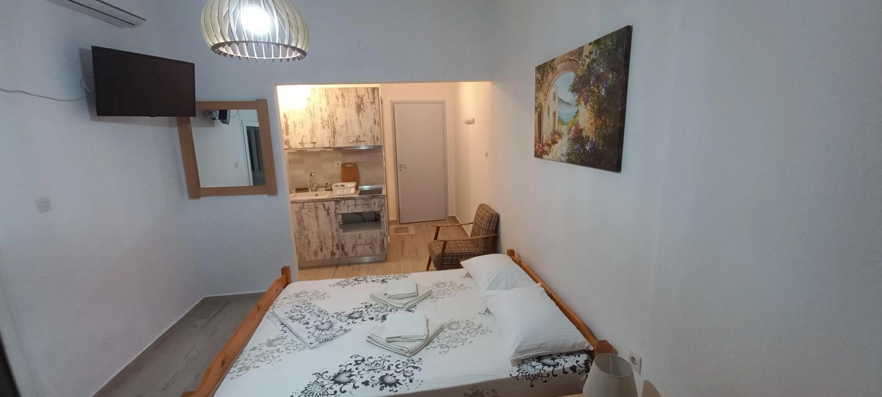 Bed in Velikis Apartments