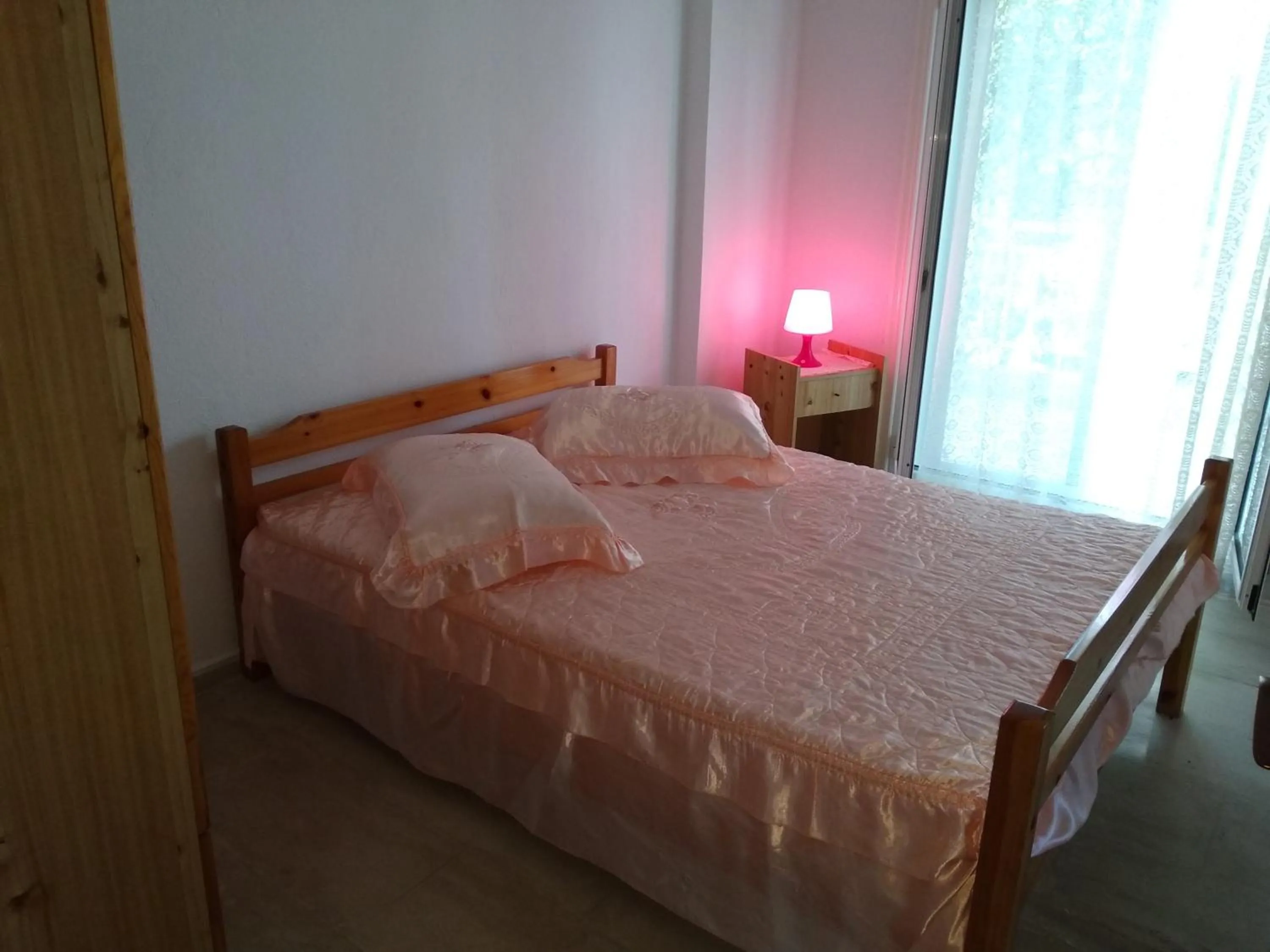 Bed in Velikis Apartments