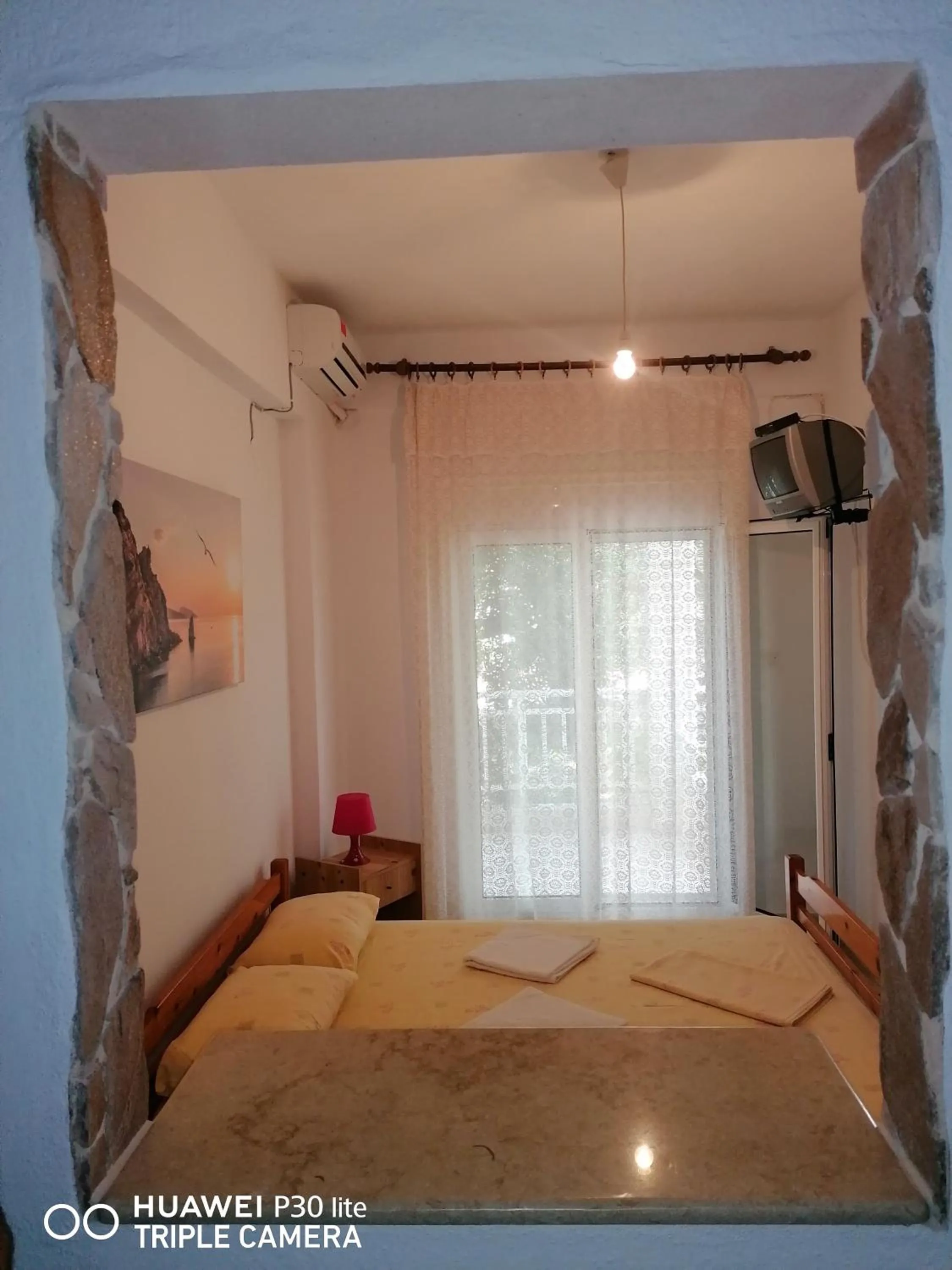 Bed in Velikis Apartments