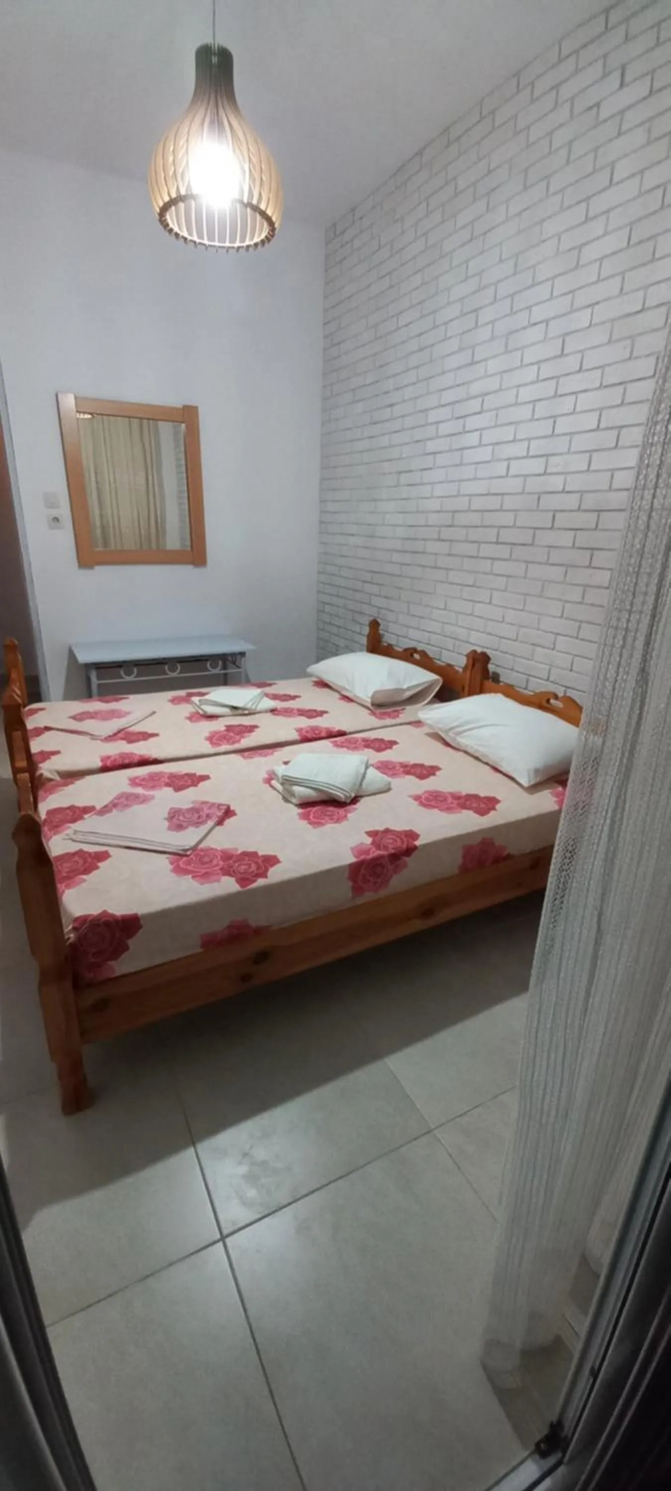 Bed in Velikis Apartments