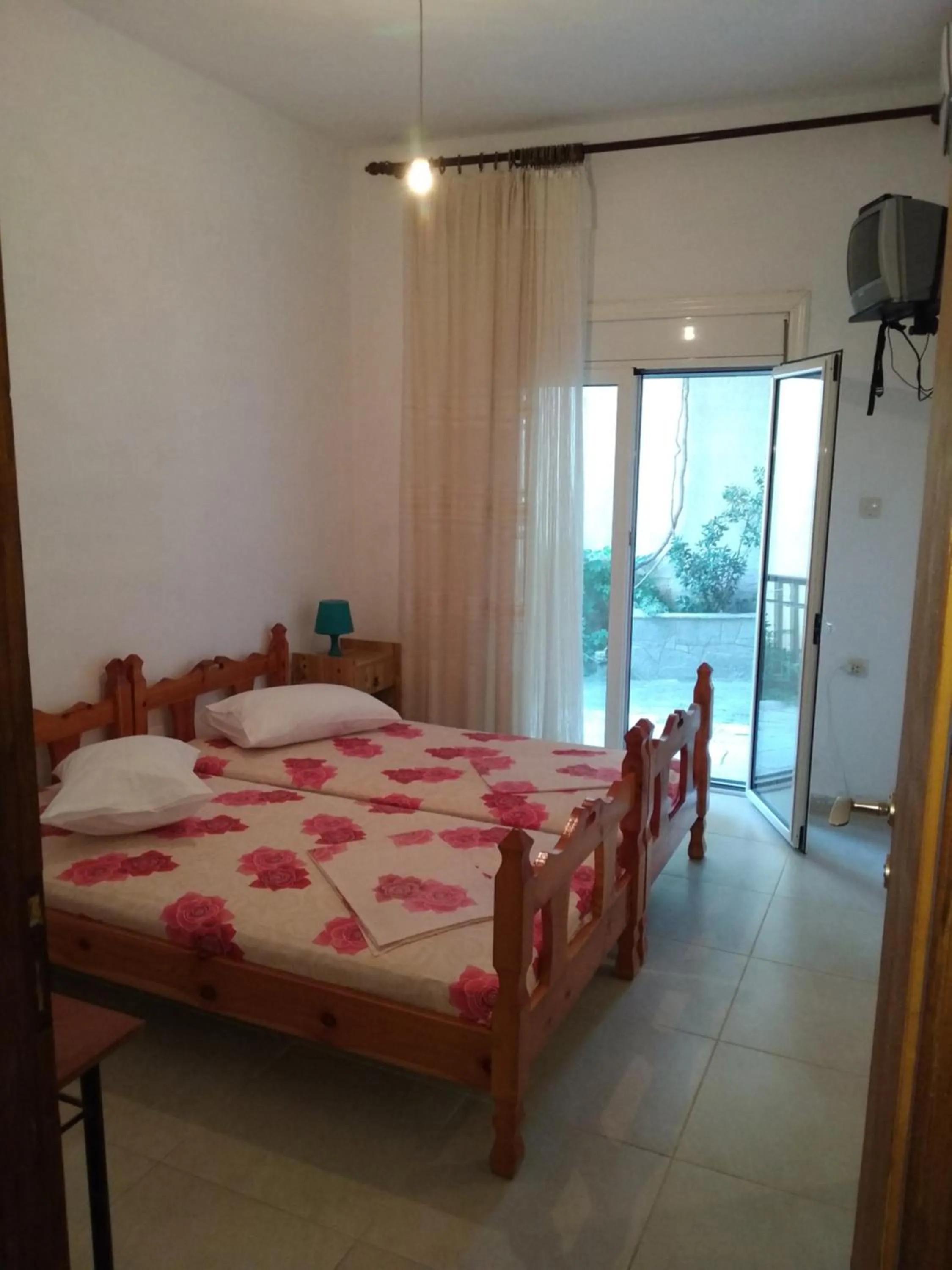 Bed in Velikis Apartments