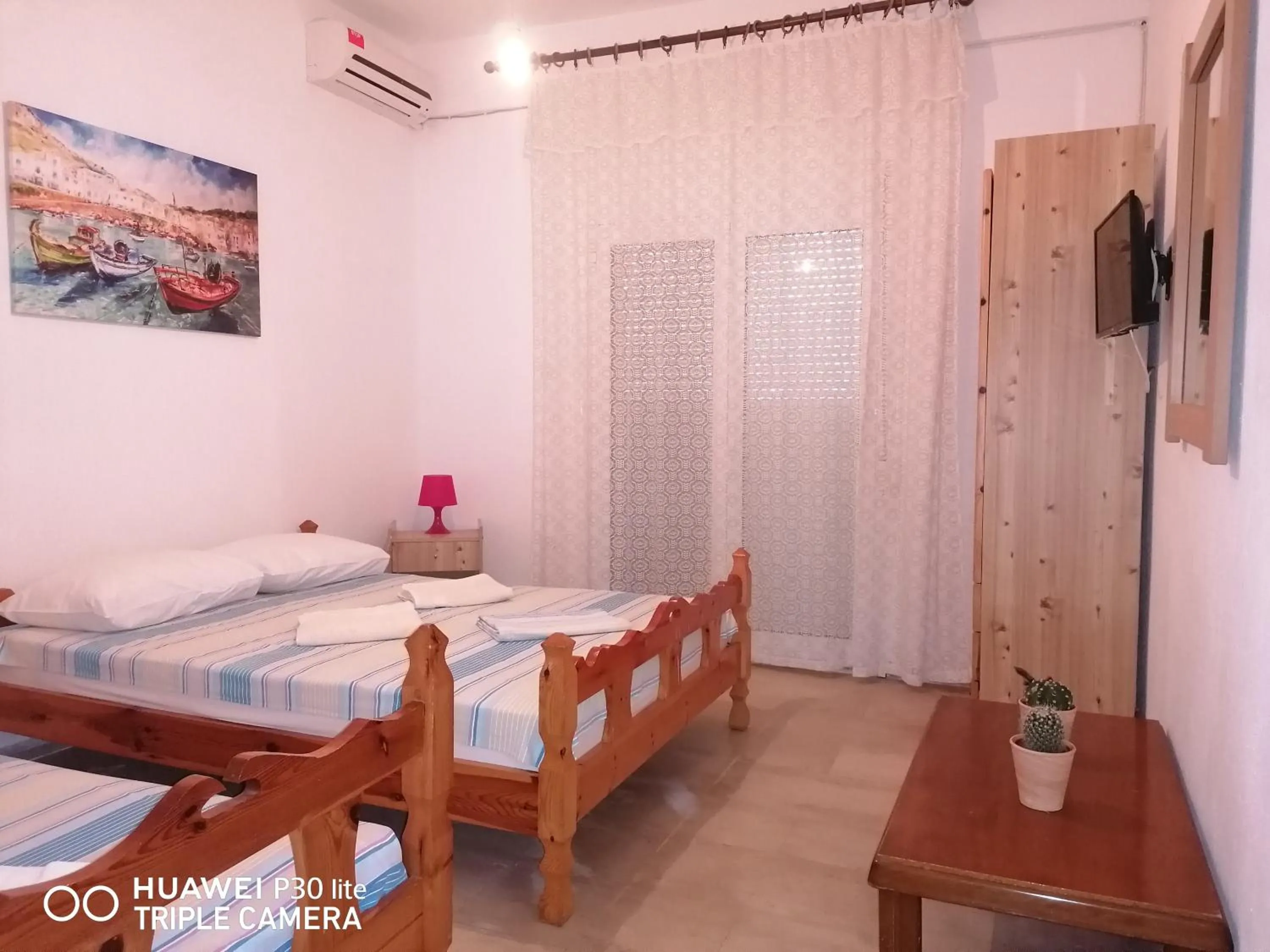 Bed in Velikis Apartments