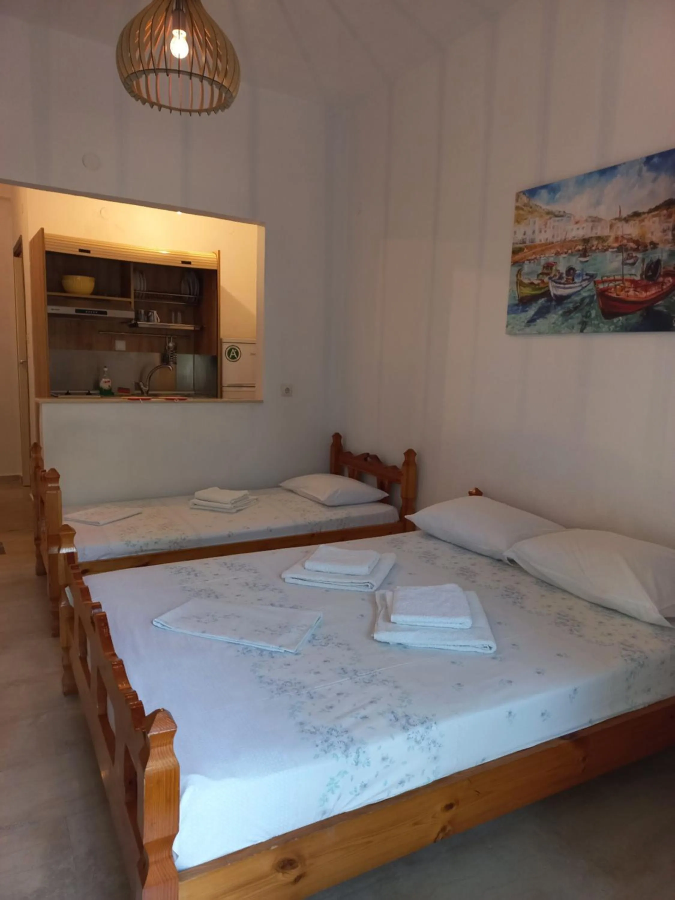 Bed in Velikis Apartments