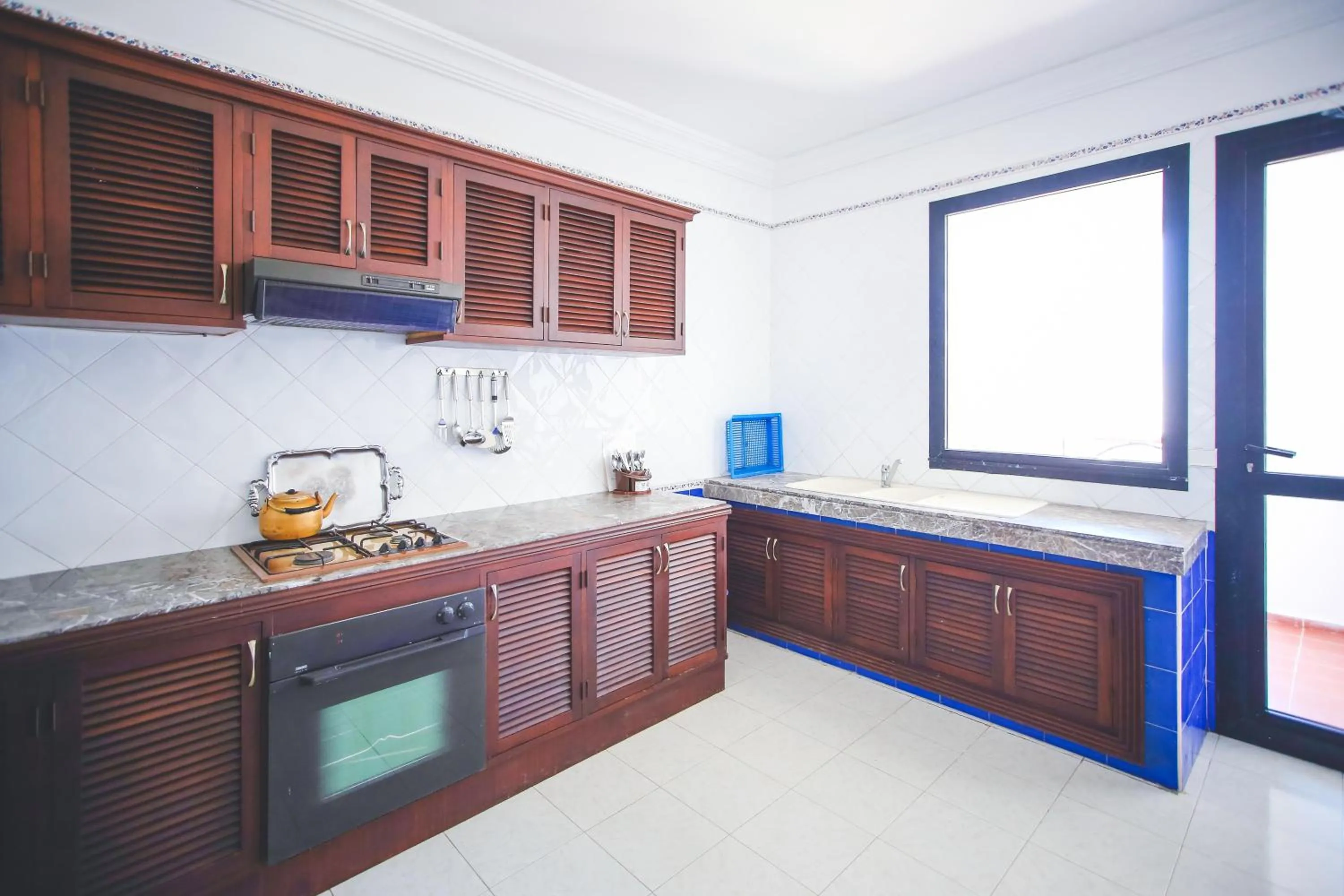 Kitchen or kitchenette in Appart Hotel Alia