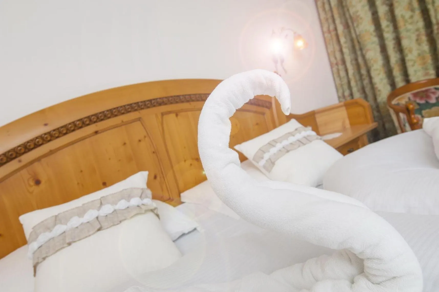 Bed in Albergo al Cervo - Gasthof zum Hirschen