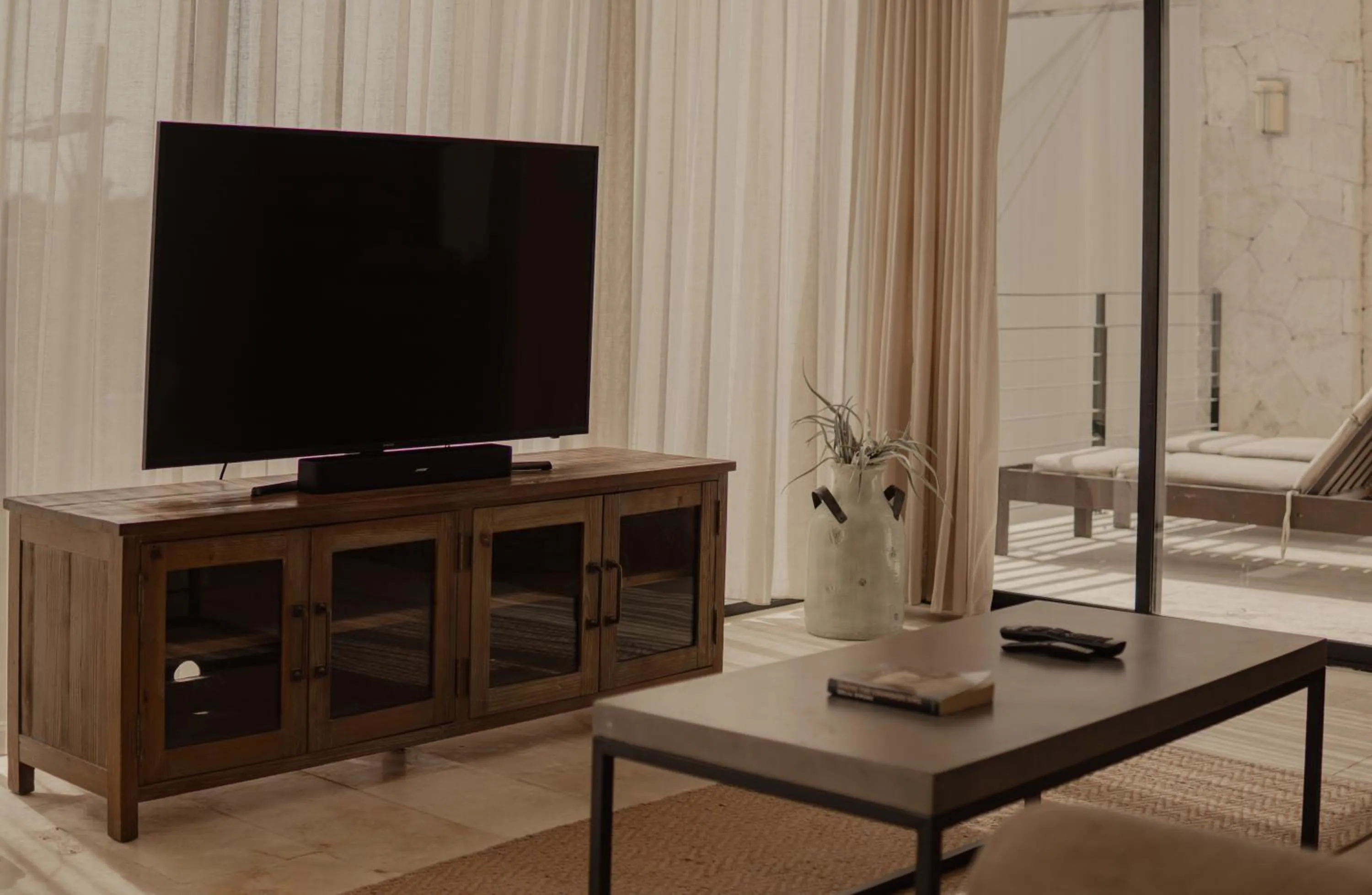 Communal lounge/ TV room in The Strabon Tulum