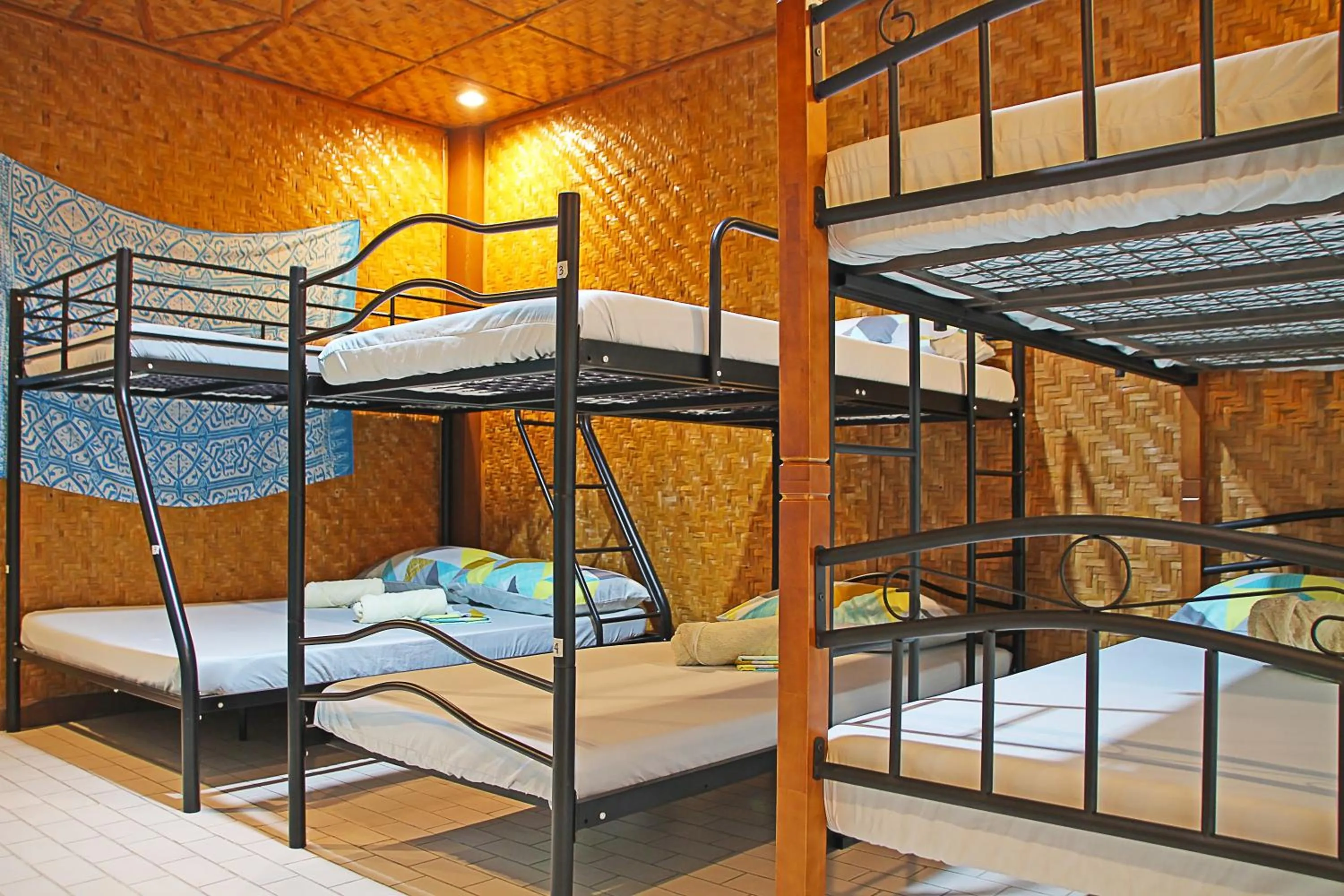 Bed in 1888 Beach Resort