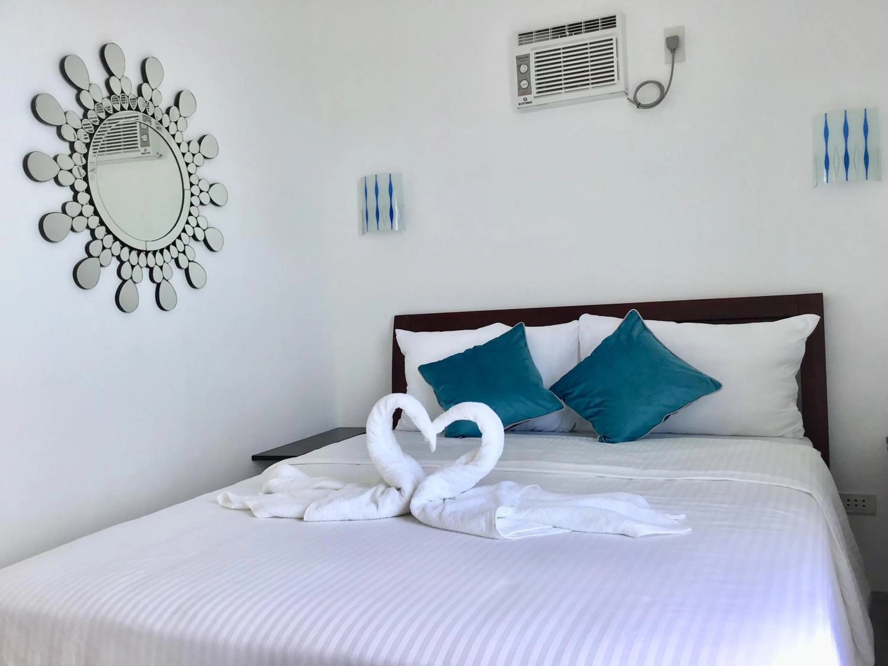 Bed in 1888 Beach Resort