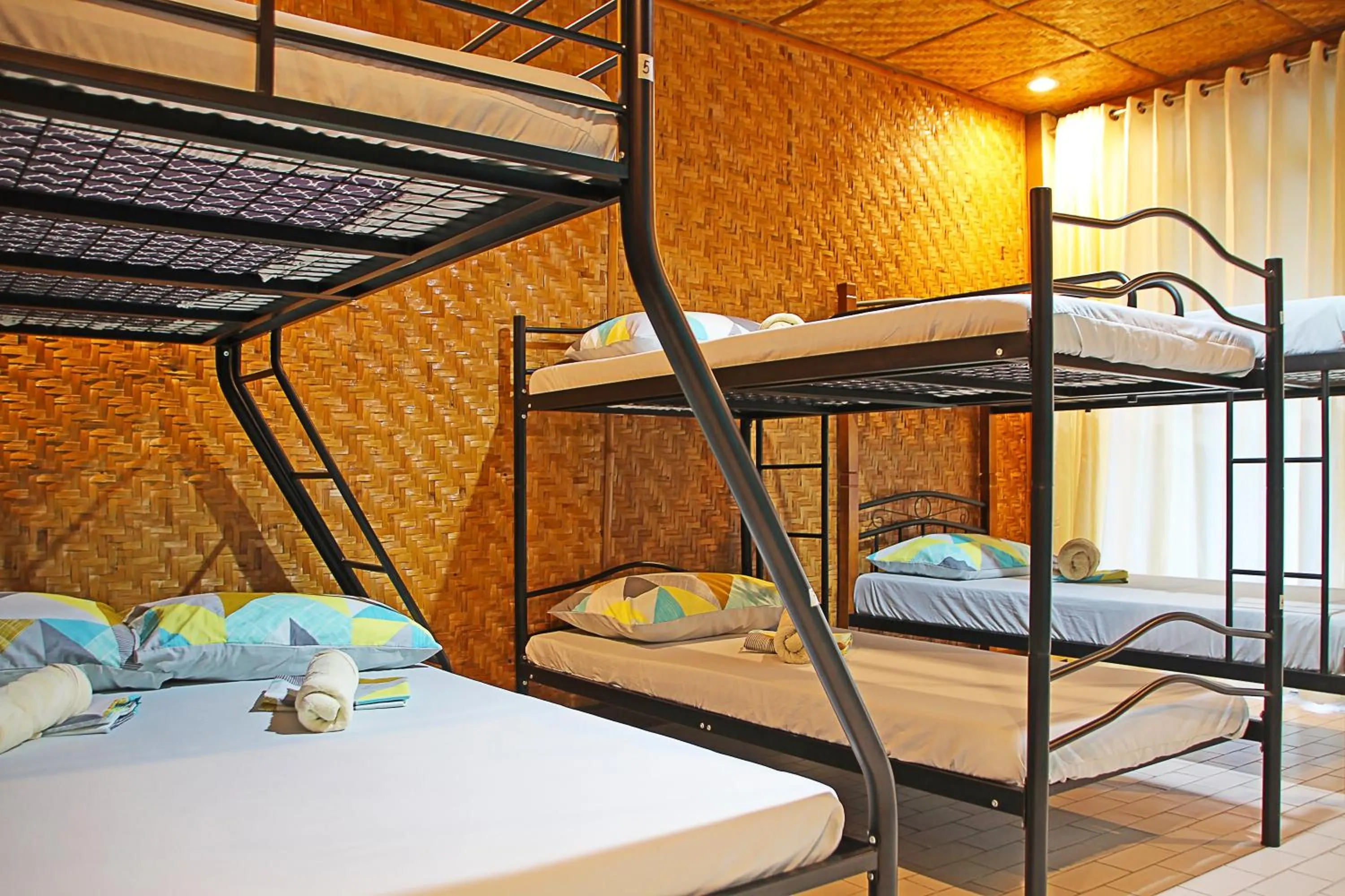 Bed in 1888 Beach Resort