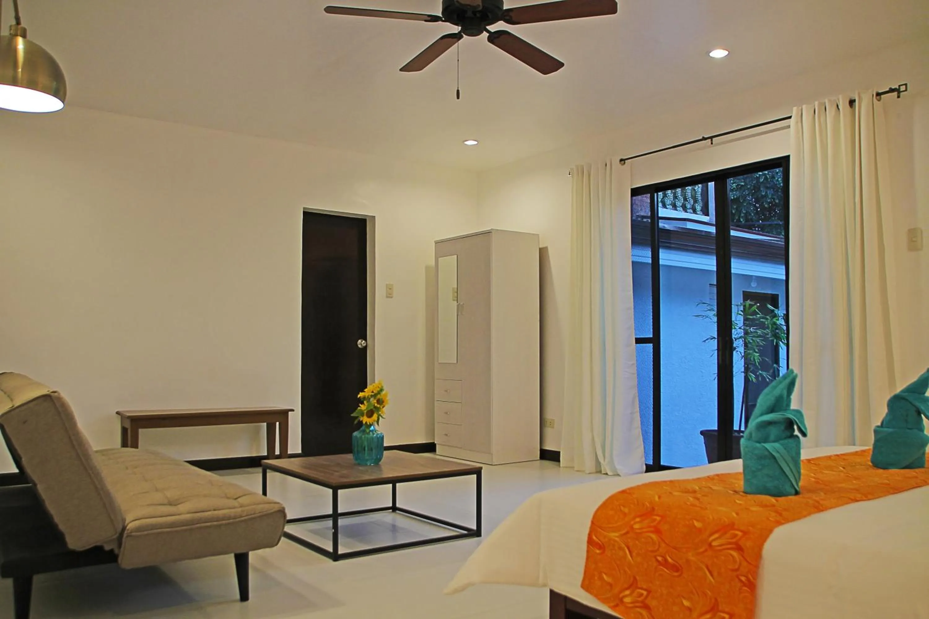 Bed in 1888 Beach Resort