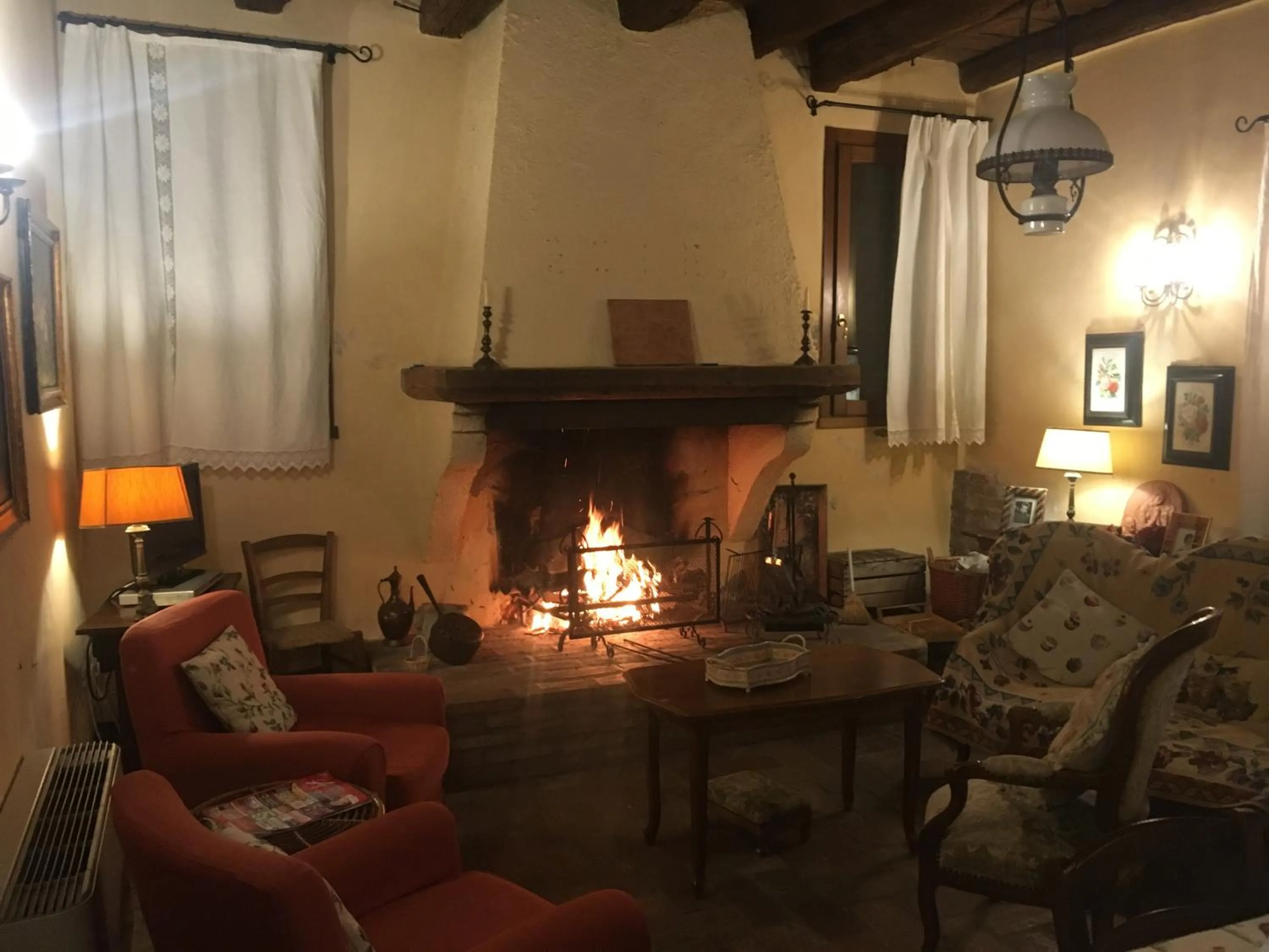 Communal lounge/ TV room in Agriturismo La Cascinetta
