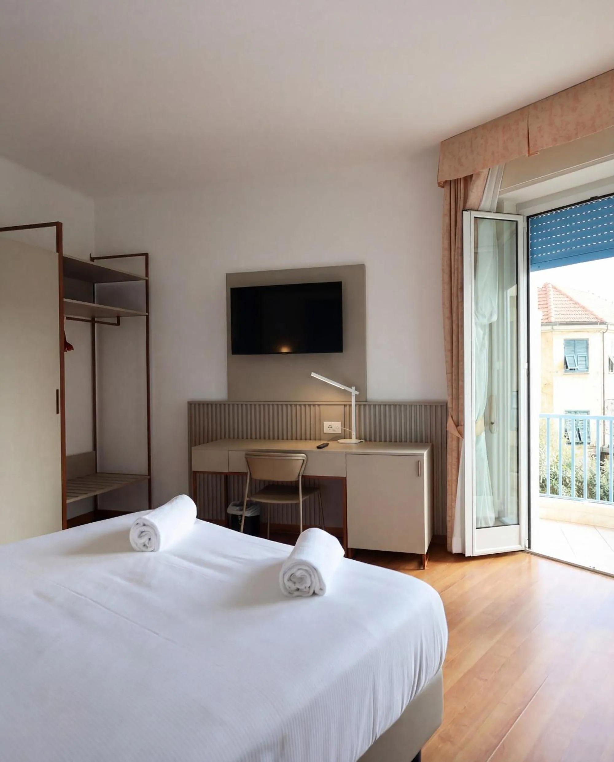 Communal lounge/ TV room, Bed in LVG Hotel Collection - Majestic