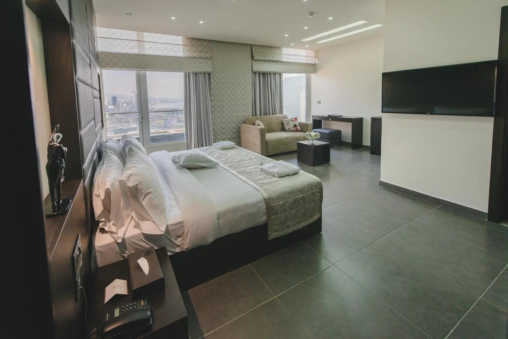 Photo of the whole room, Bed in Louis V Hotel Beirut