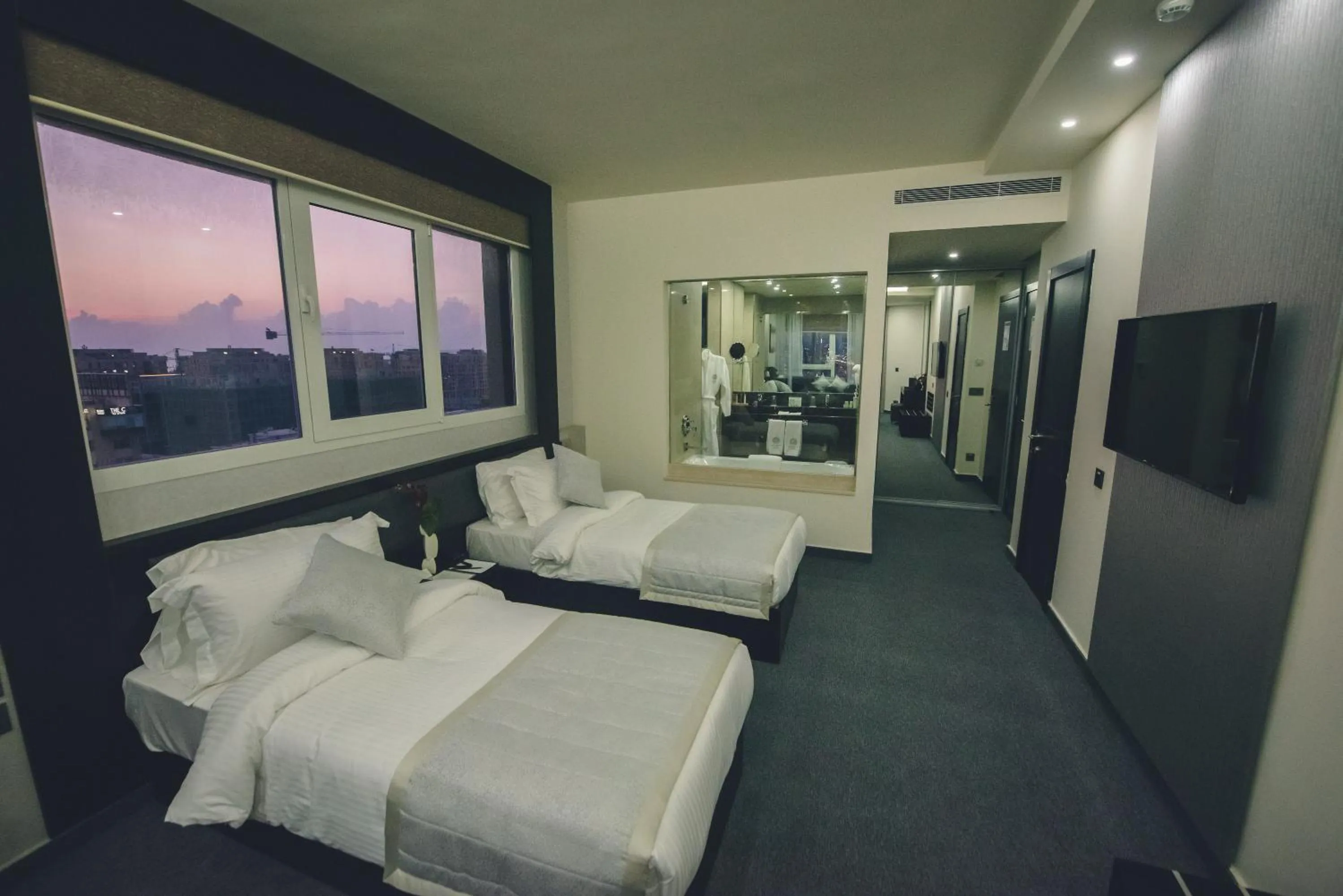 Photo of the whole room, Bed in Louis V Hotel Beirut