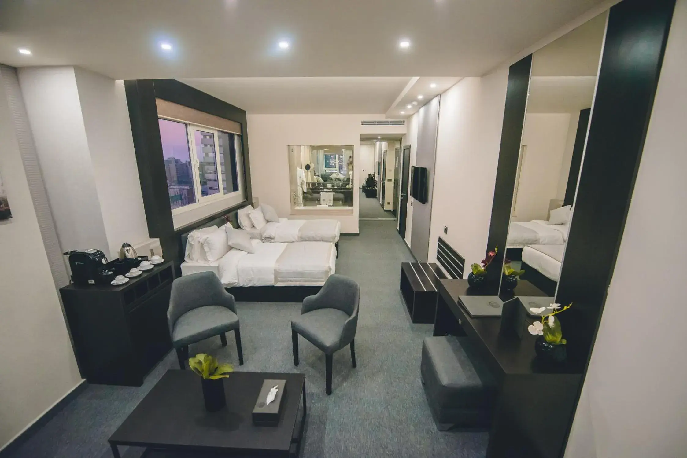 Living room, Bed in Louis V Hotel Beirut Living room, Bed in Louis V Hotel Beirut