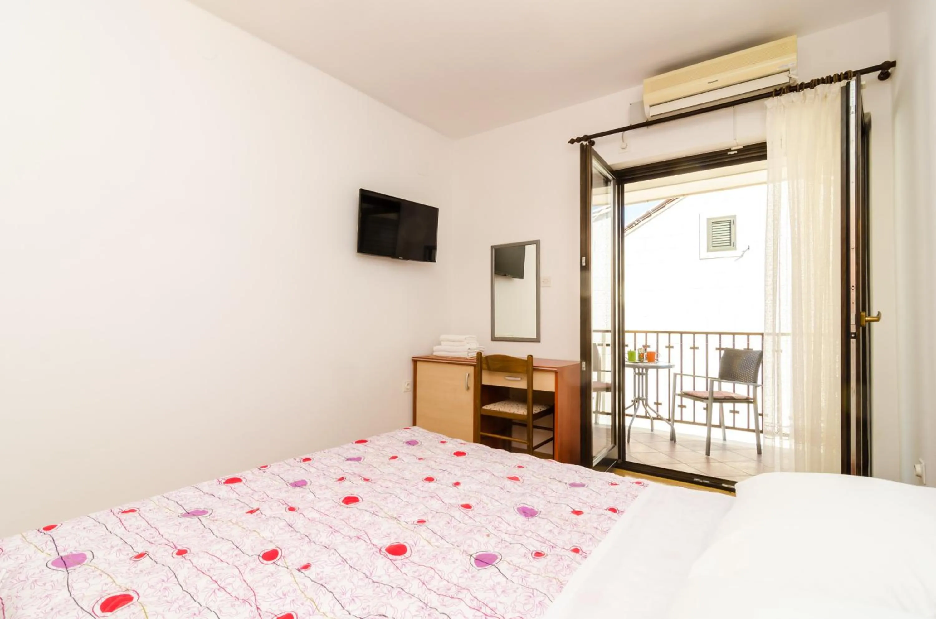 Bed in Cina Apartments