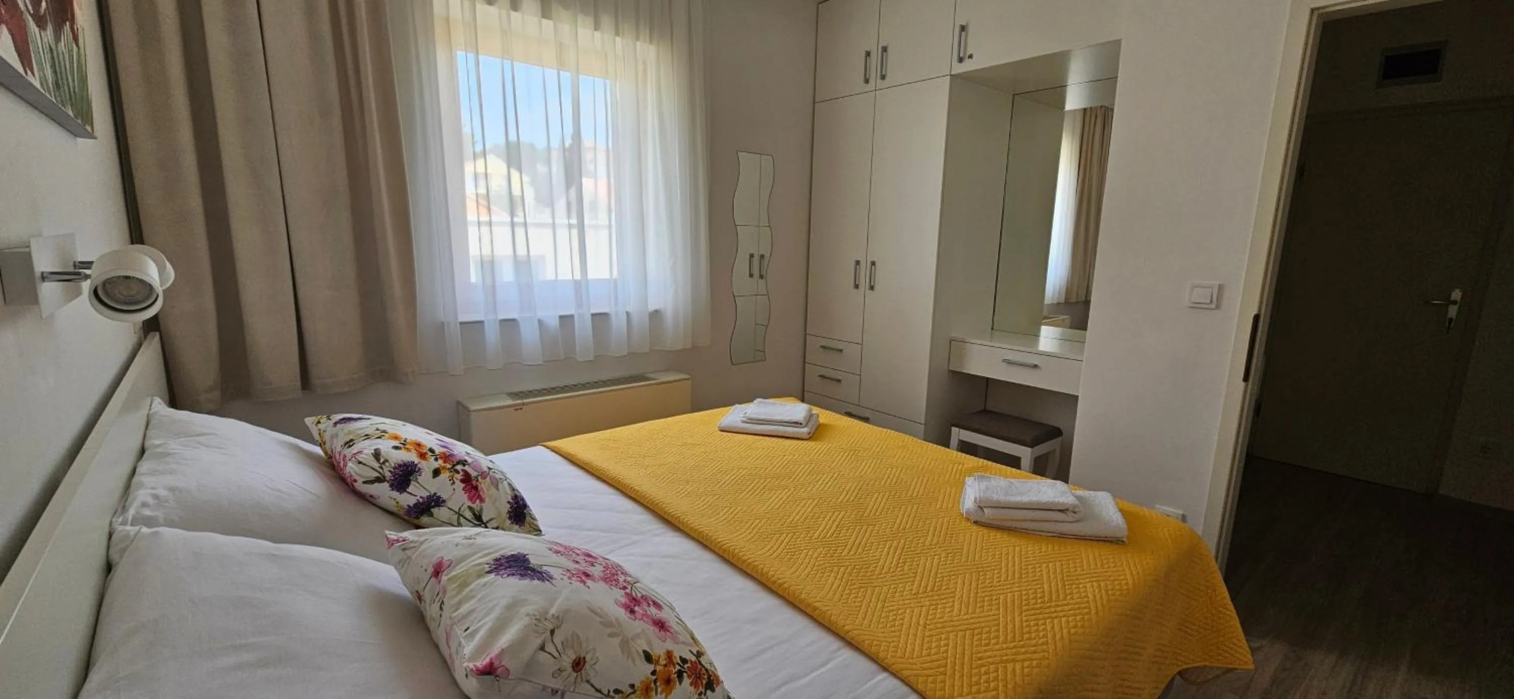 Bedroom in Cina Apartments