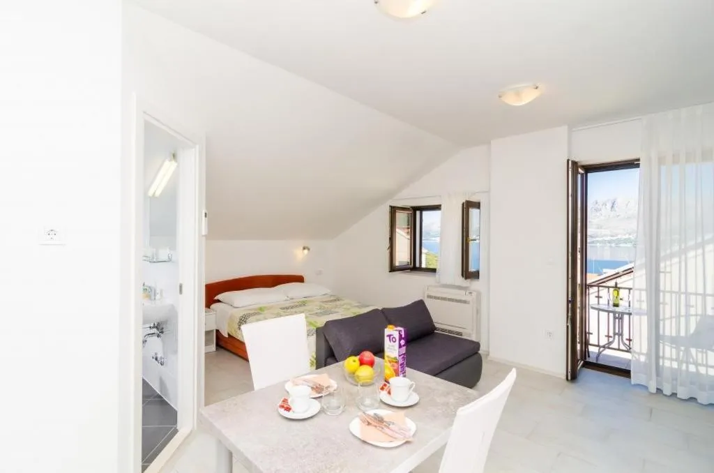 Bed in Cina Apartments