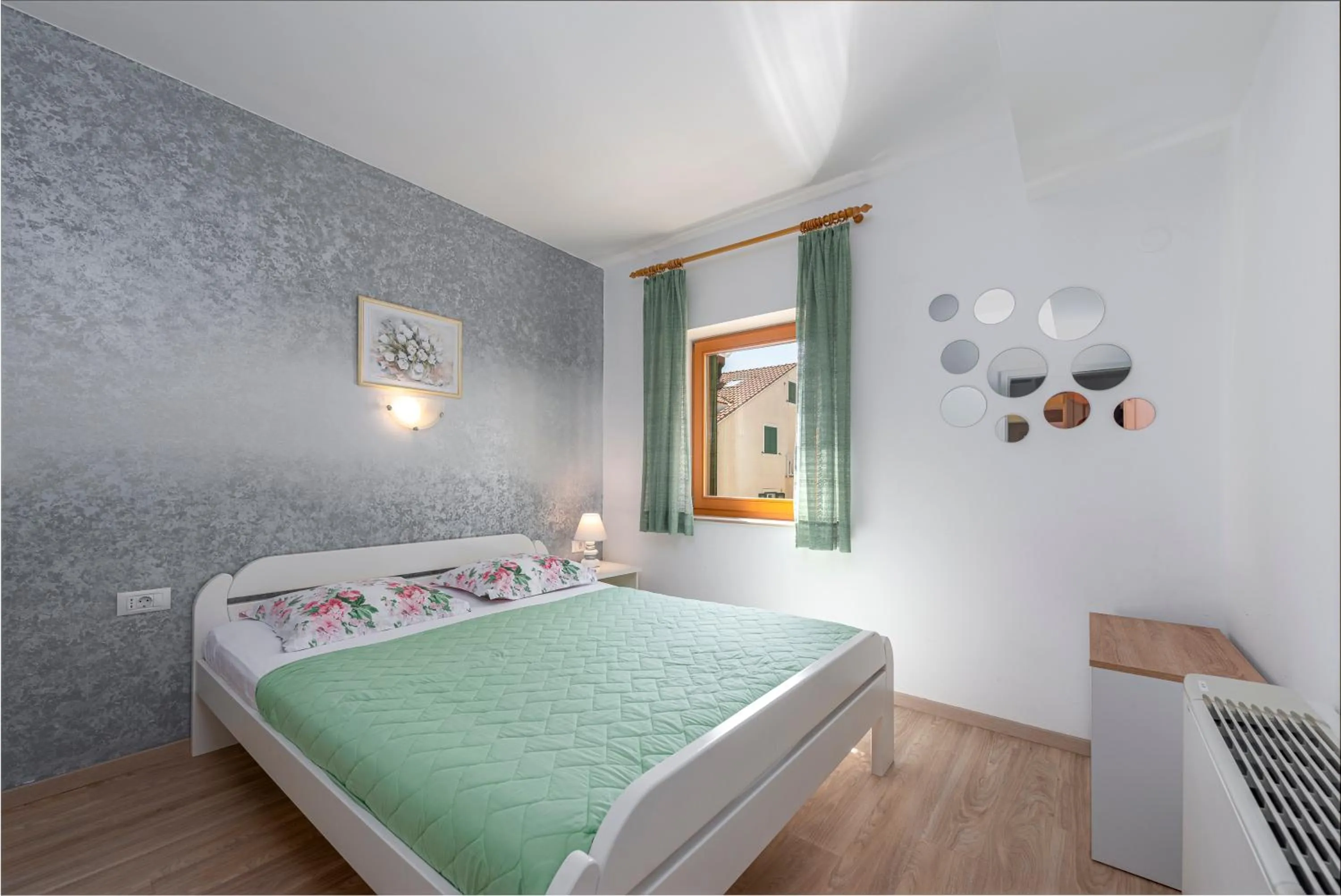 Bedroom in Cina Apartments