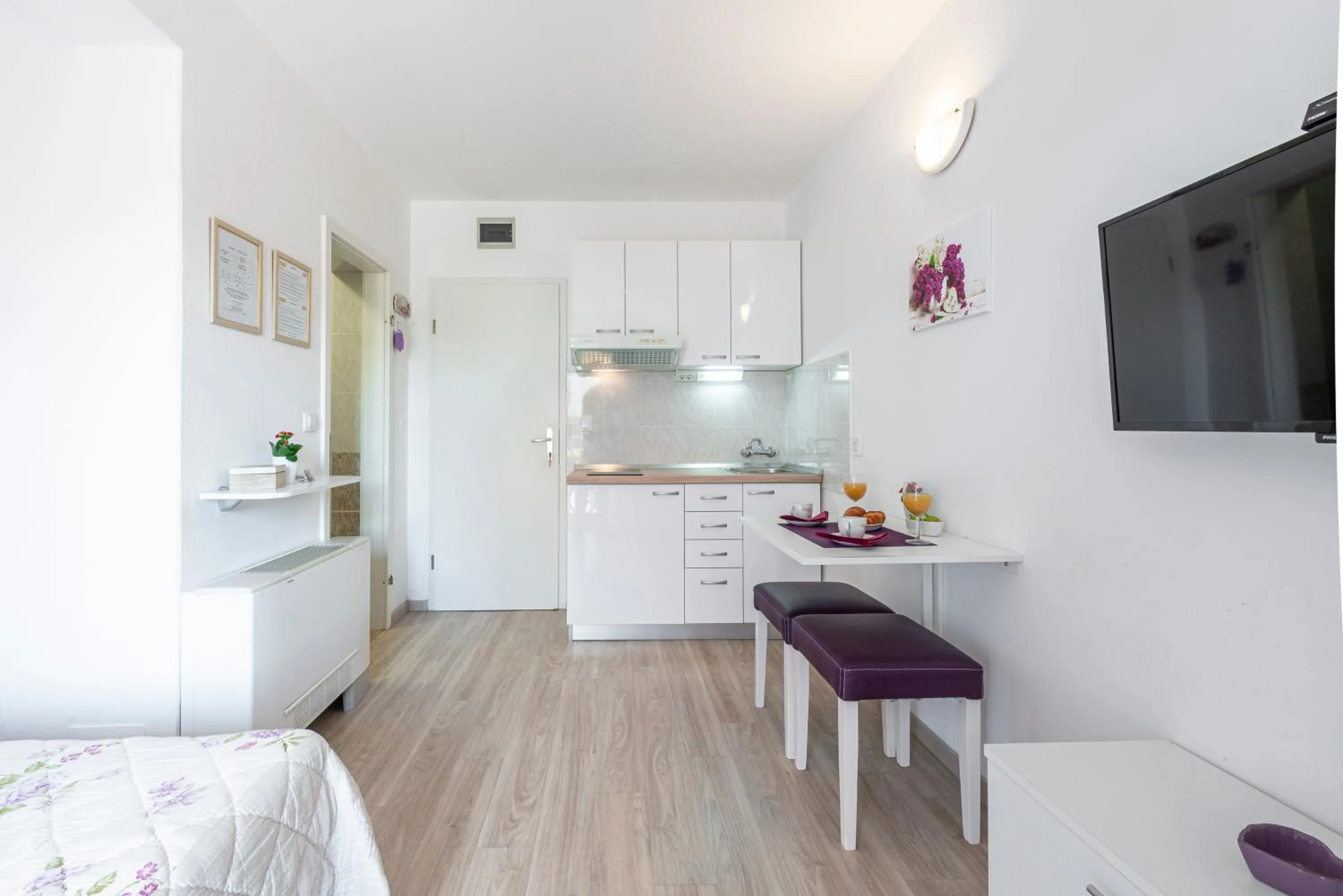 Kitchen or kitchenette in Cina Apartments