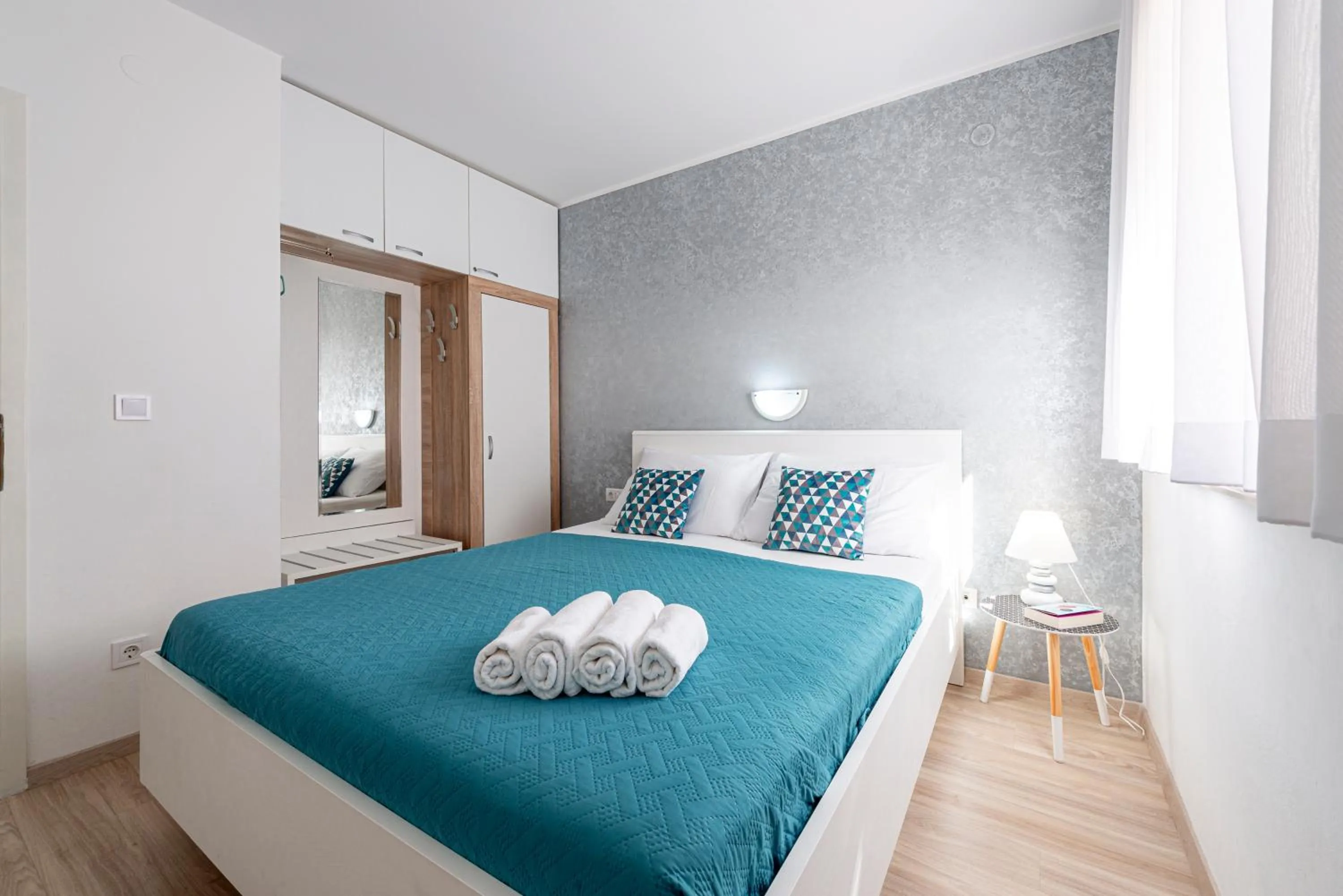 Bedroom in Cina Apartments