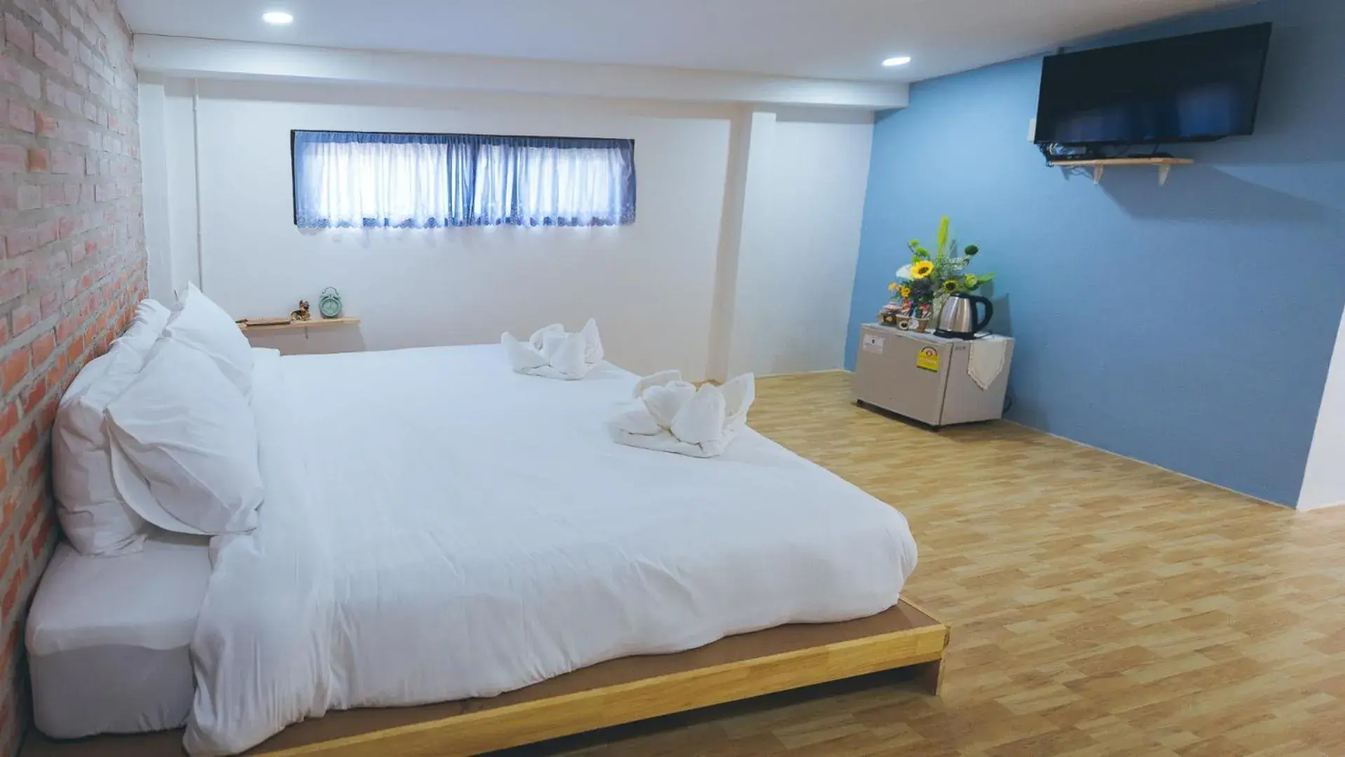 Bed in Wang Jai Kwang Space Inn Bed in Wang Jai Kwang Space Inn